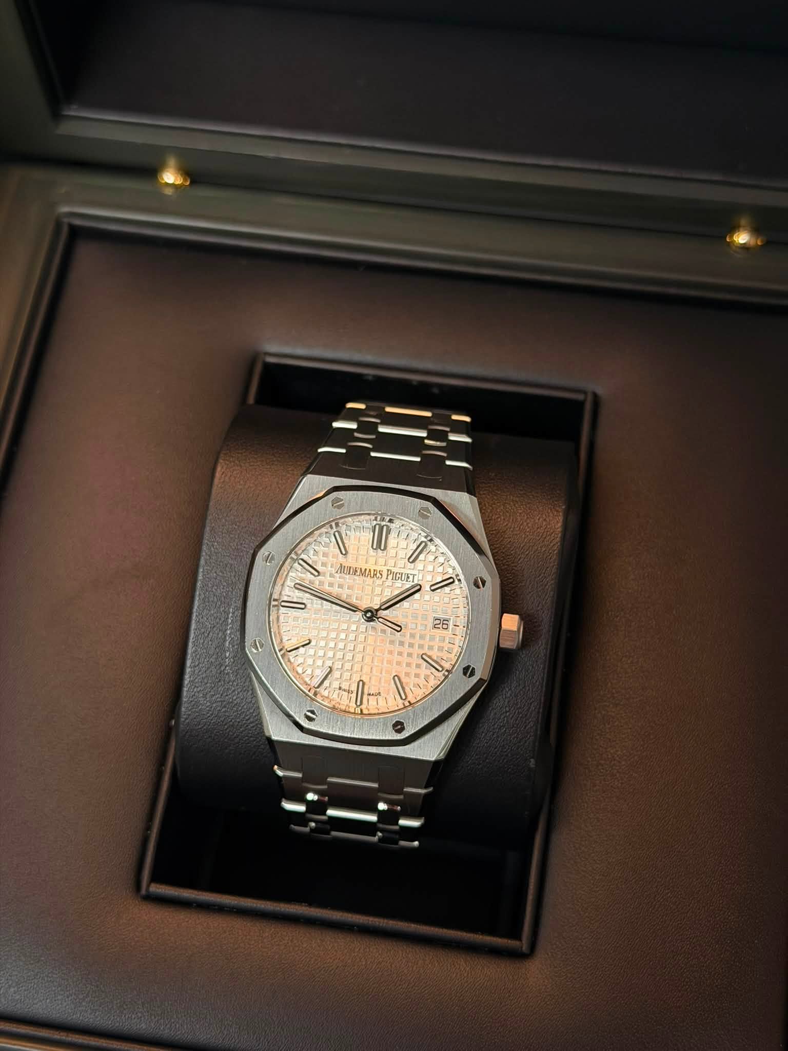 May be an image of wrist watch and text
