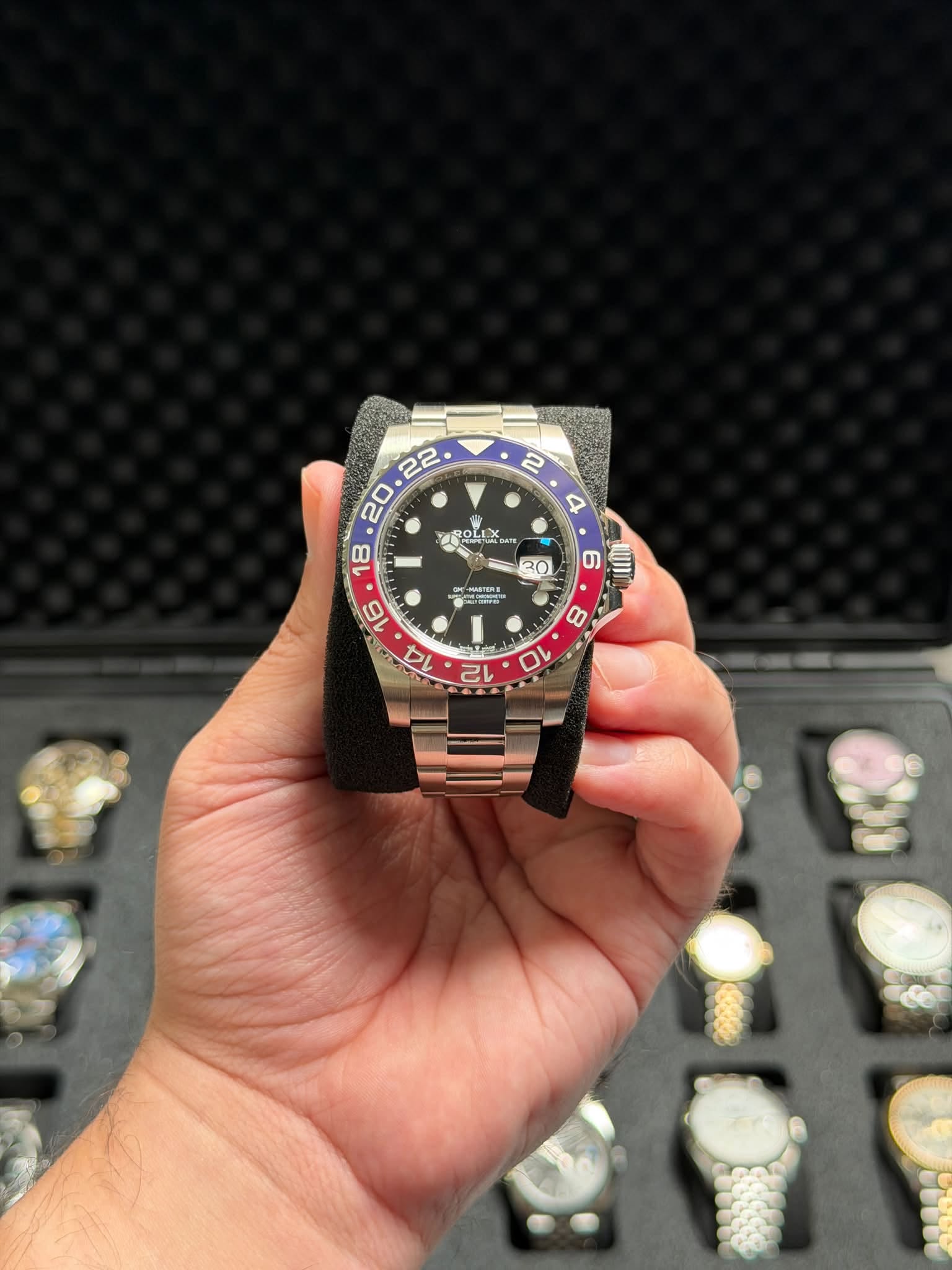 May be an image of wrist watch and text