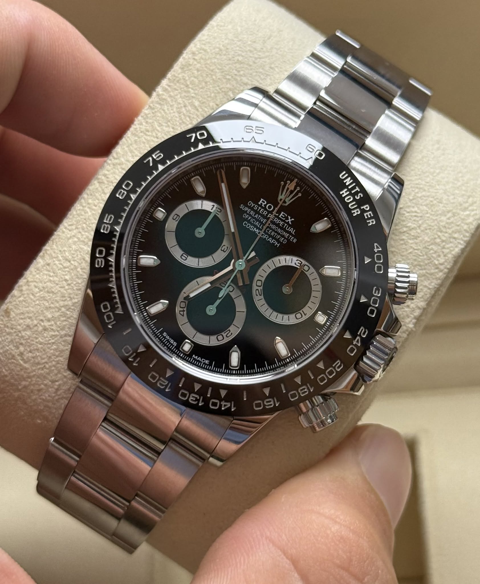 May be an image of wrist watch and text
