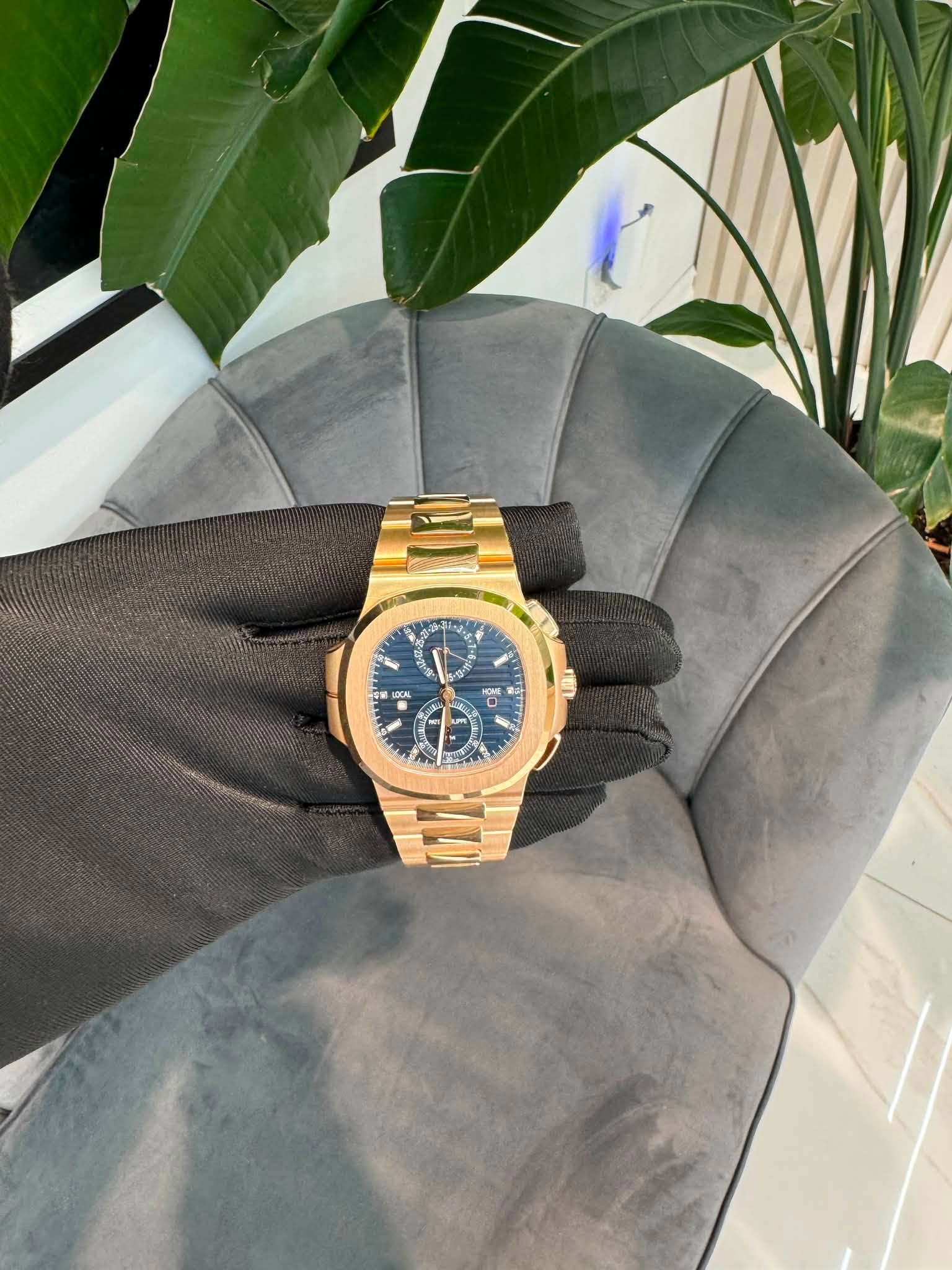 May be an image of wrist watch and text