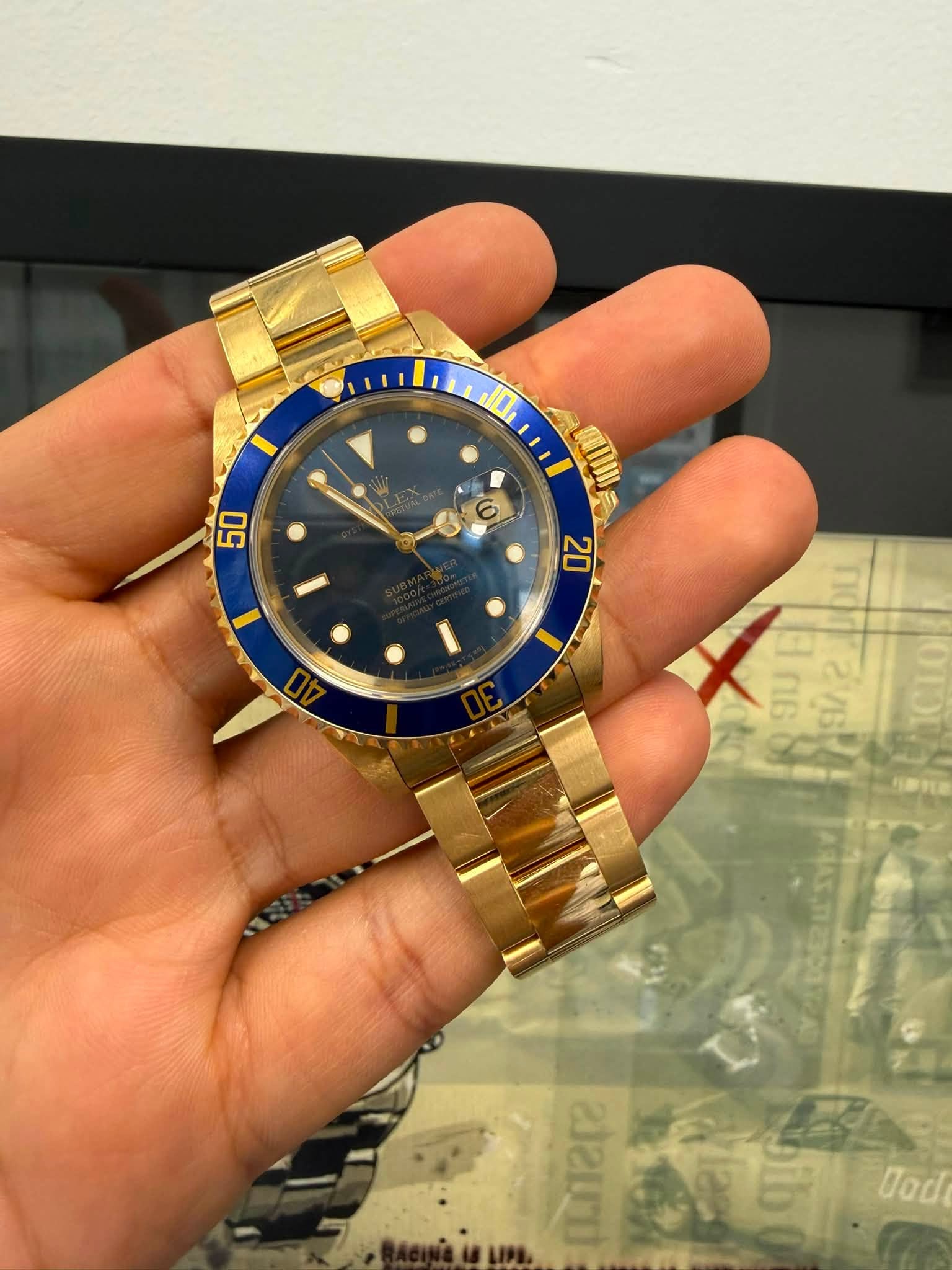 May be an image of wrist watch and text