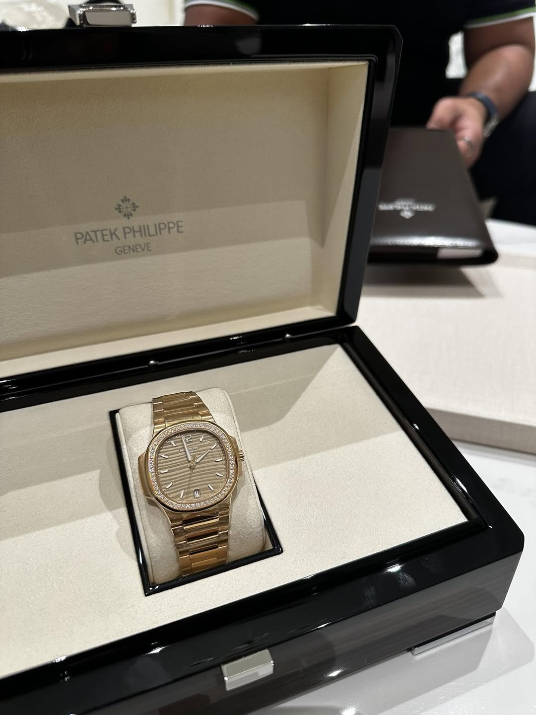 May be an image of wrist watch and text