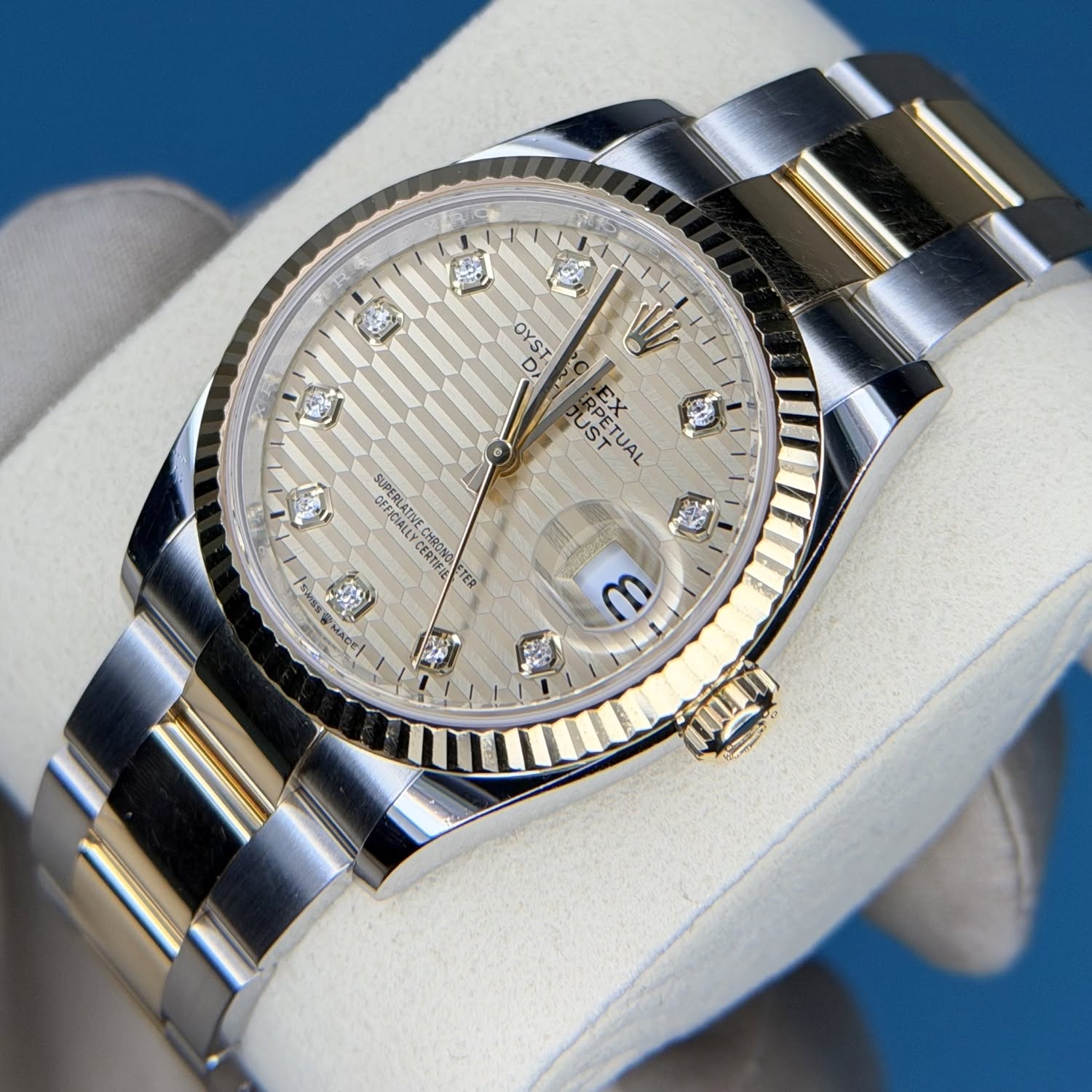 May be an image of wrist watch and text