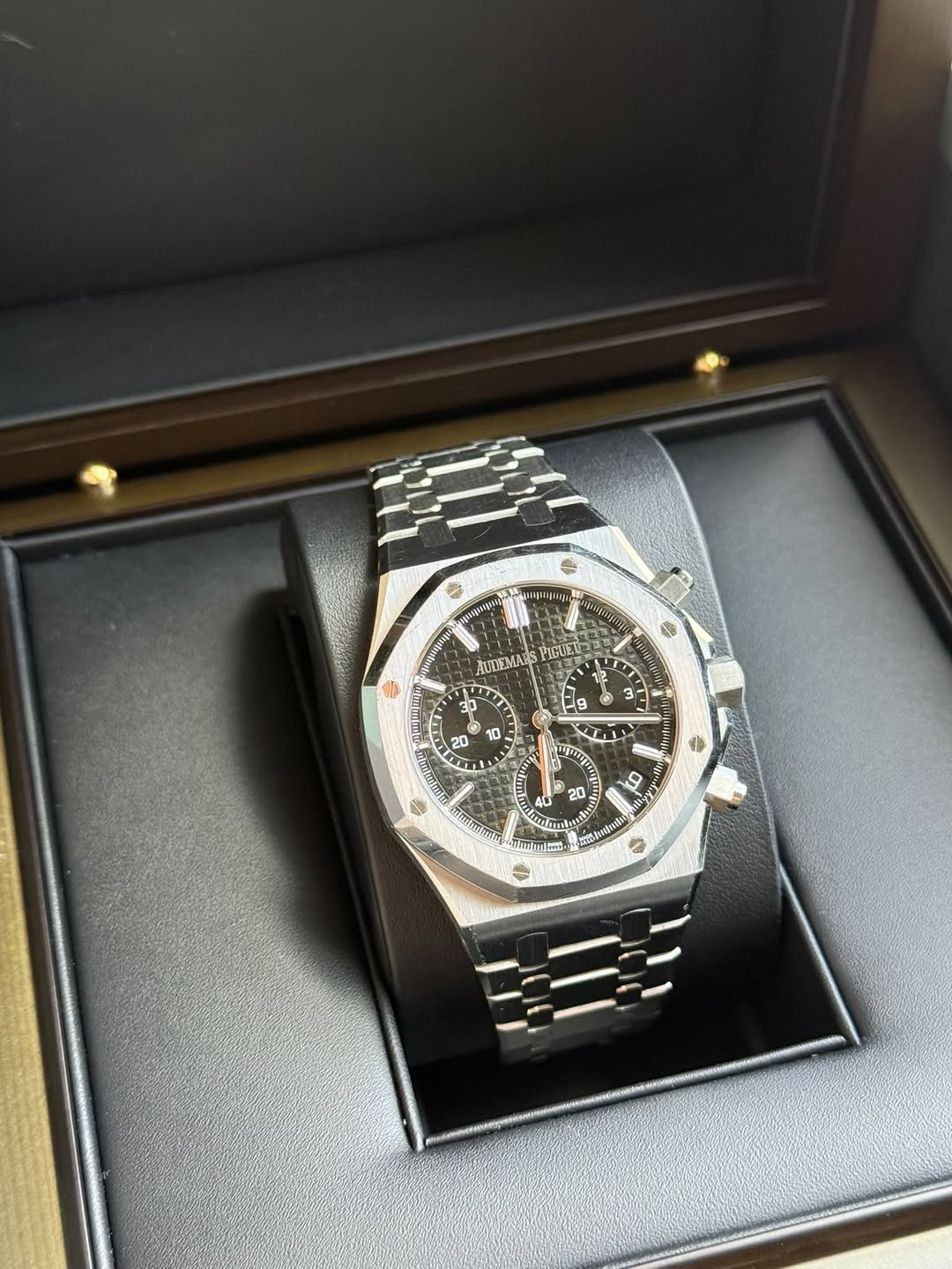 May be an image of wrist watch and text