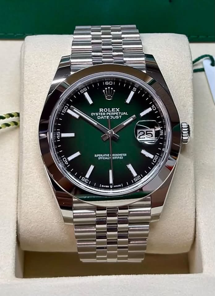 May be an image of wrist watch and text that says '60 55 تم 5 50 10 ROLEX OYSTERPERPETUAL OYS TERPERPETU RPETUAL OYSTER DATE JUST SUPERLATIVE ARONOMETER OFFICIALLY ERTIFIED แแทบ…