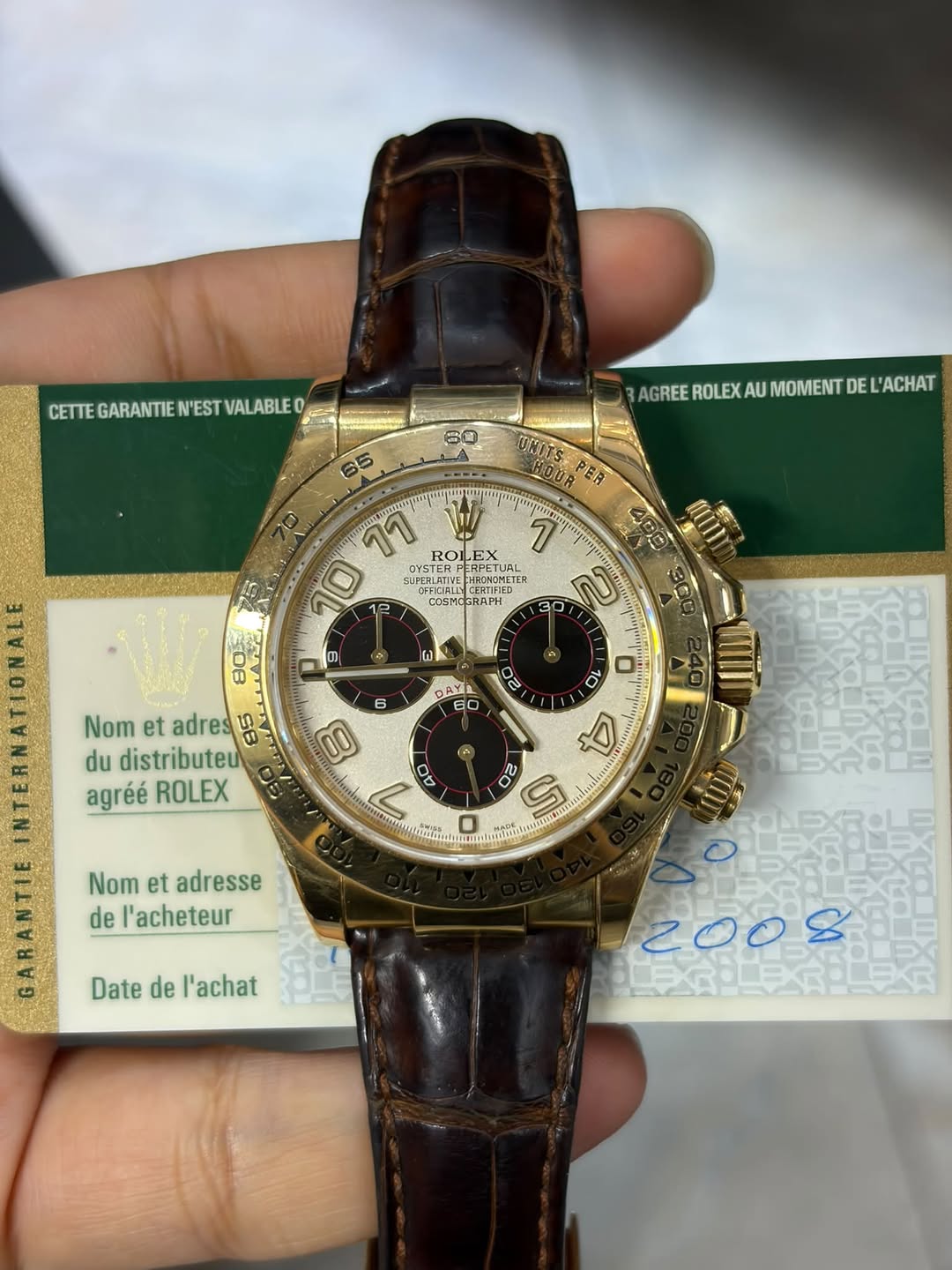 May be an image of wrist watch and text that says 'CETTE GARANTIE CETEGARANTIEWESTVALABLEO 'EST VALABLEO 60 65 AGREE ROLEX AU MOMENT DE L'ACHAT KHITSPER KOHOT COUR PER 11 ROL EX…