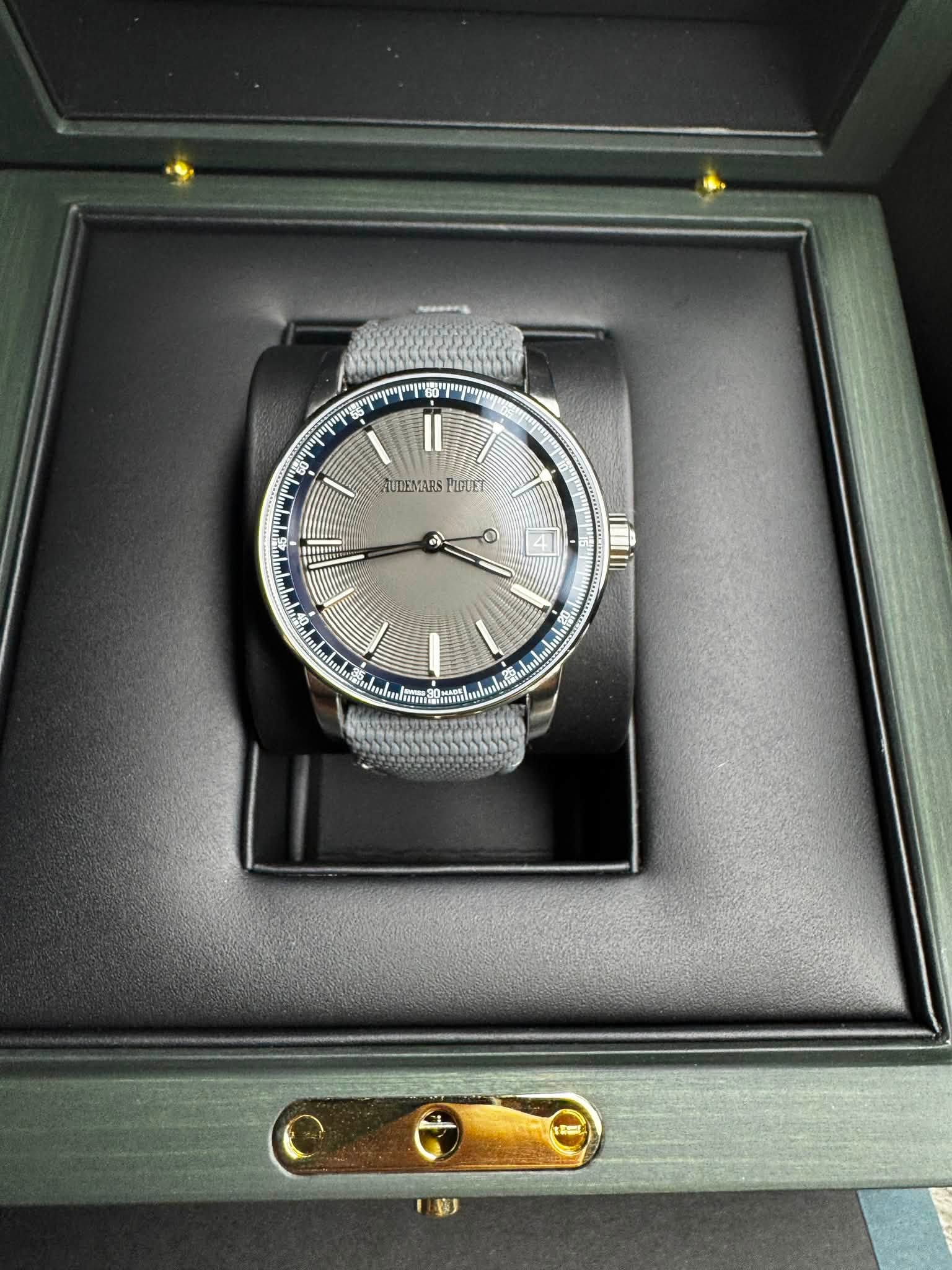 May be an image of wrist watch and text that says 'W M ል O'