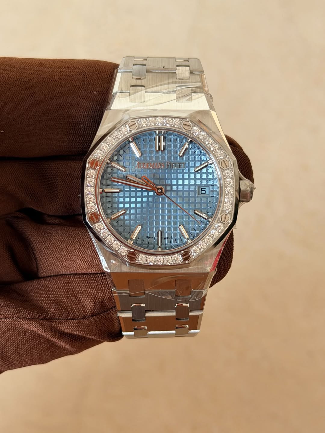 May be an image of wrist watch and text