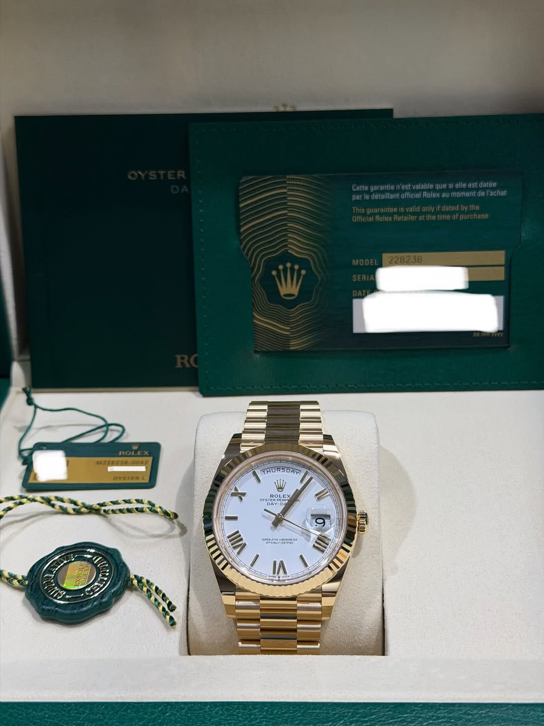 May be an image of wrist watch and text