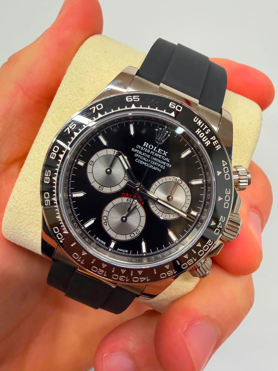 May be an image of wrist watch and text