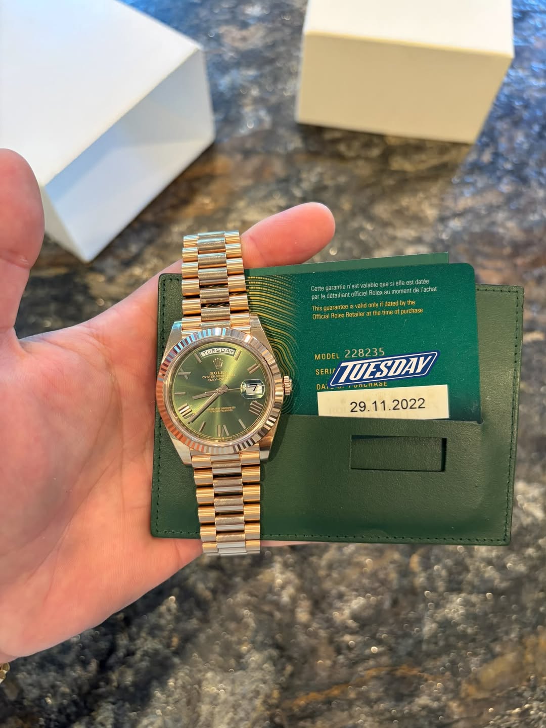 May be an image of wrist watch and text