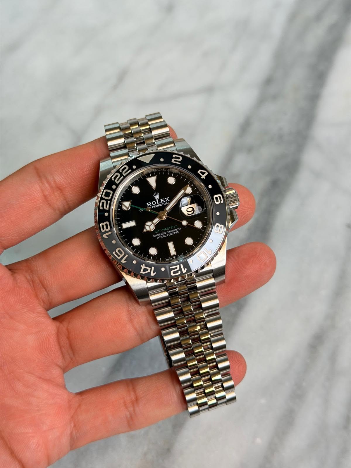 May be an image of wrist watch and text that says ' ROLEX EX ROi ROLE 16 カ 己'