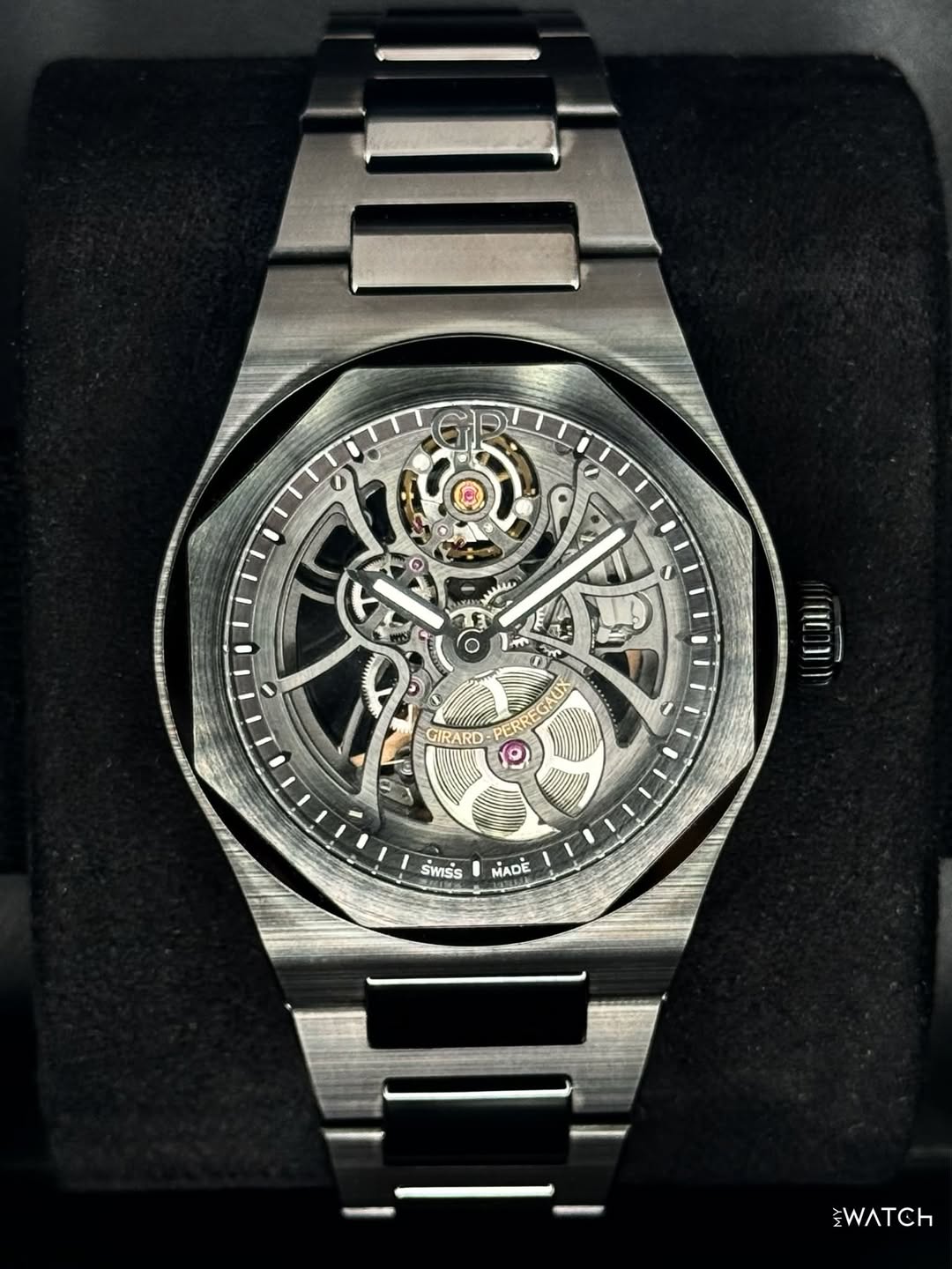 May be an image of wrist watch and text