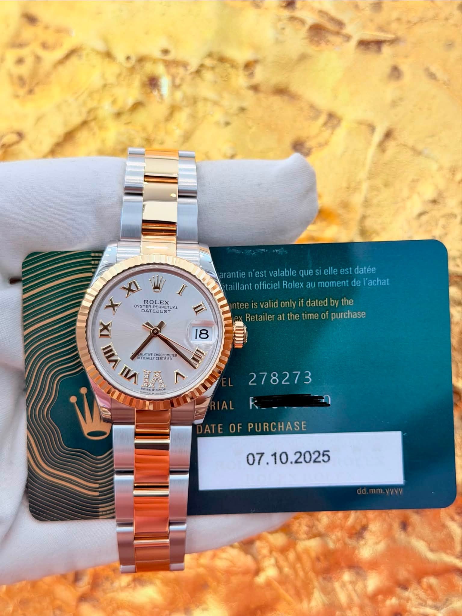 May be an image of wrist watch and text that says 'I 1 aranteniestvalablequesele sielle rantien'est alable que est stdatée aillant officiel Rolex moment hilafilerarmomentdel de…