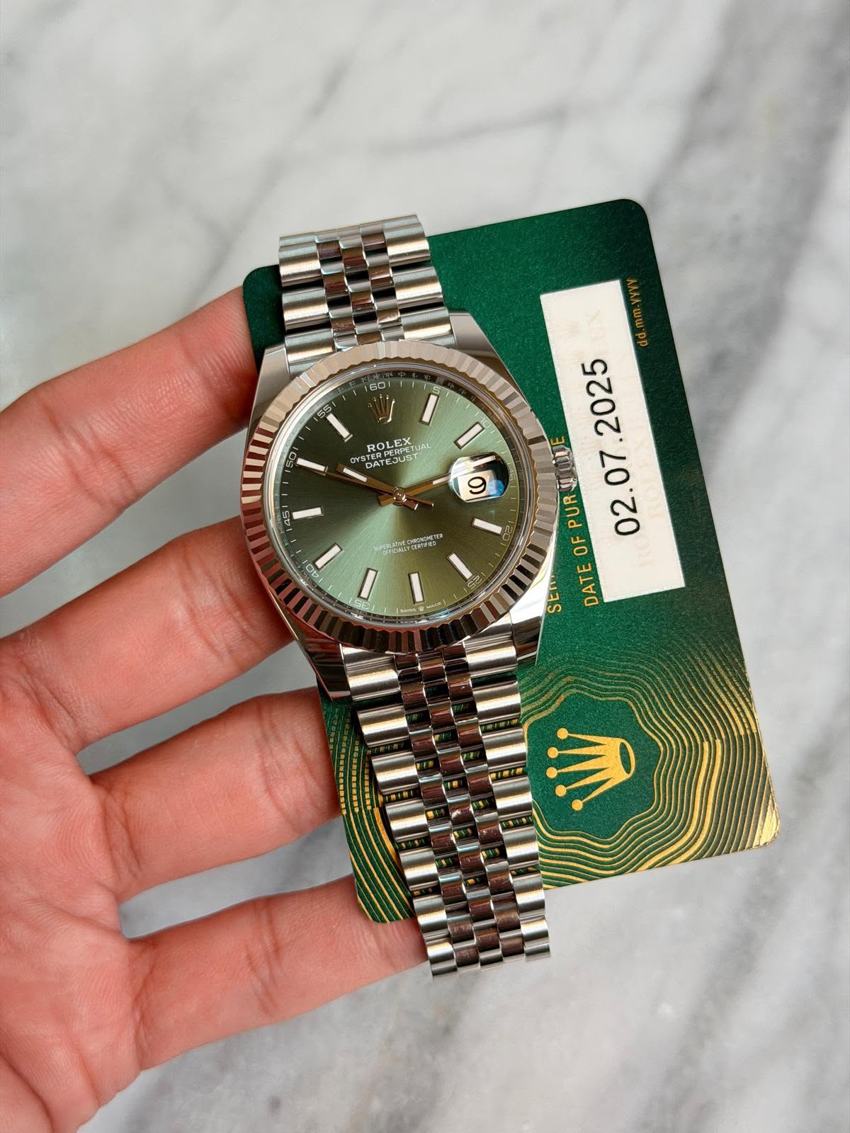 May be an image of wrist watch and text that says '60 ROLE ROL OLEX عات ن PERPEE ישך שדאלם I の dd.mm.yyy 2025 AUUE . PUR 07 02.07 OF SEn DATE I'