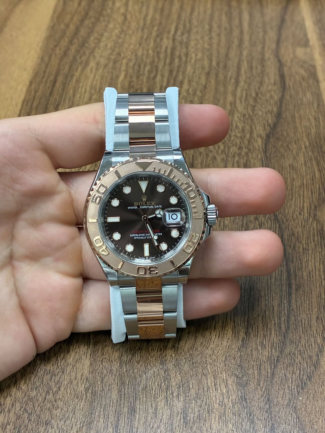 May be an image of wrist watch and text
