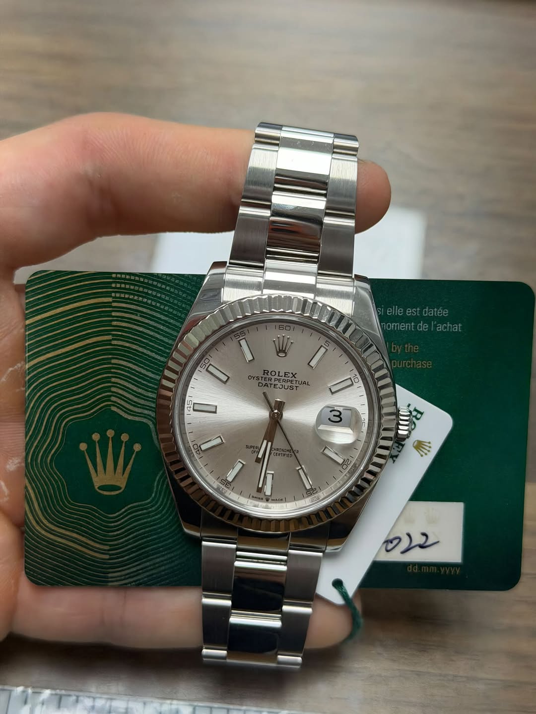 May be an image of wrist watch and text that says '150 50 lleestdatée oment.del'achat oment.o ROLEX OLEX EJUSTRI CERPETUA 145 I ก 30 3 |গর T0D000 V: HI S 022'