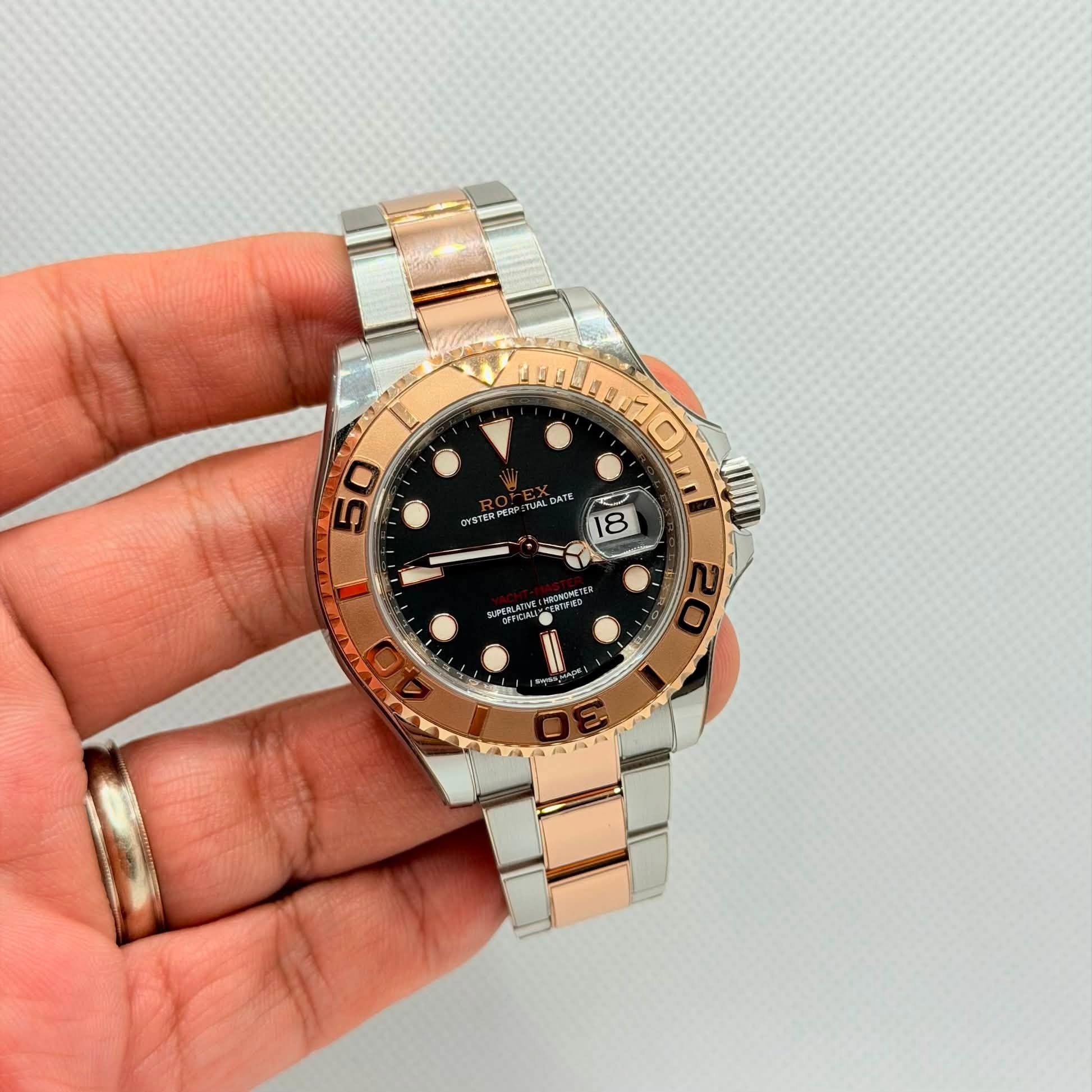 May be an image of wrist watch and text