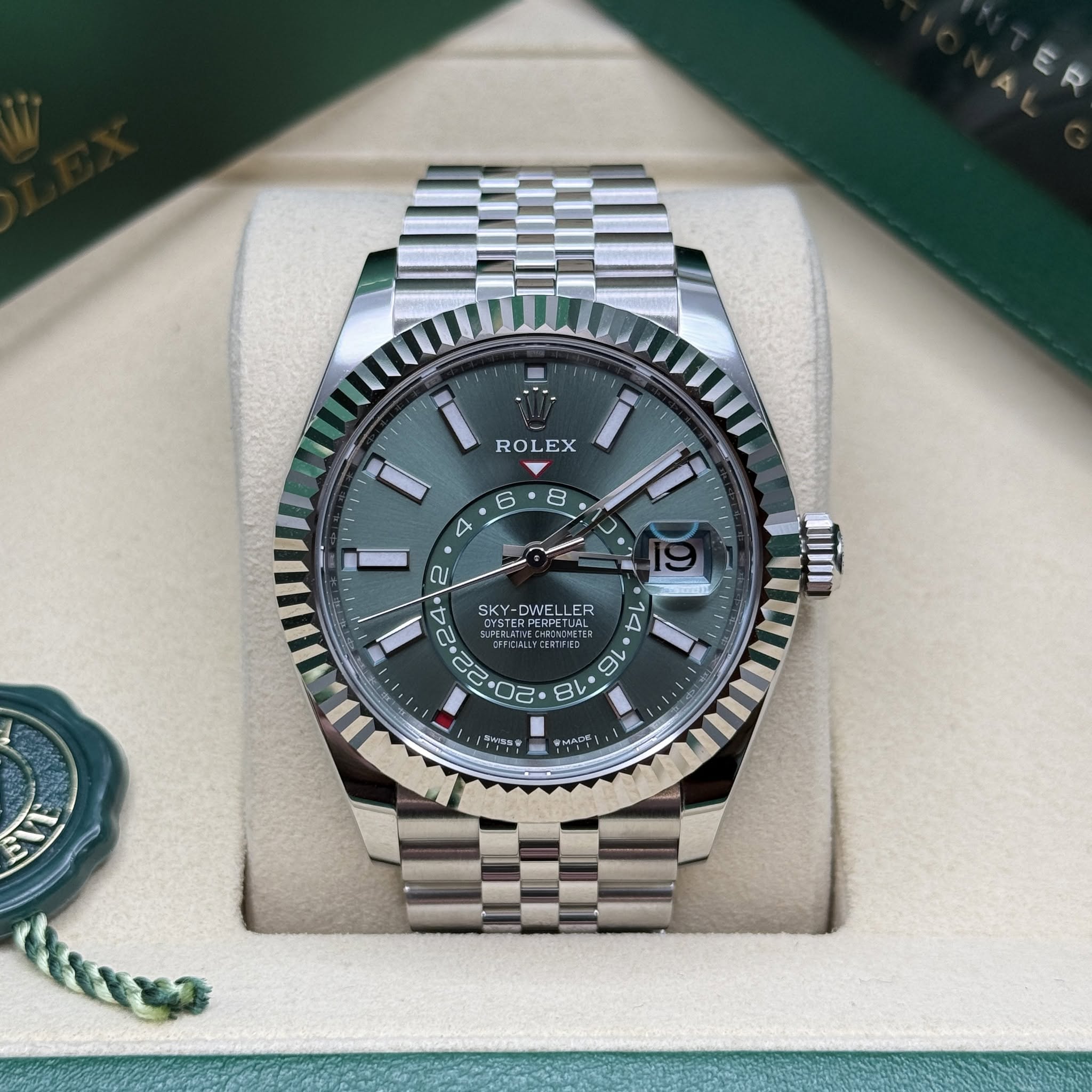 May be an image of wrist watch and text