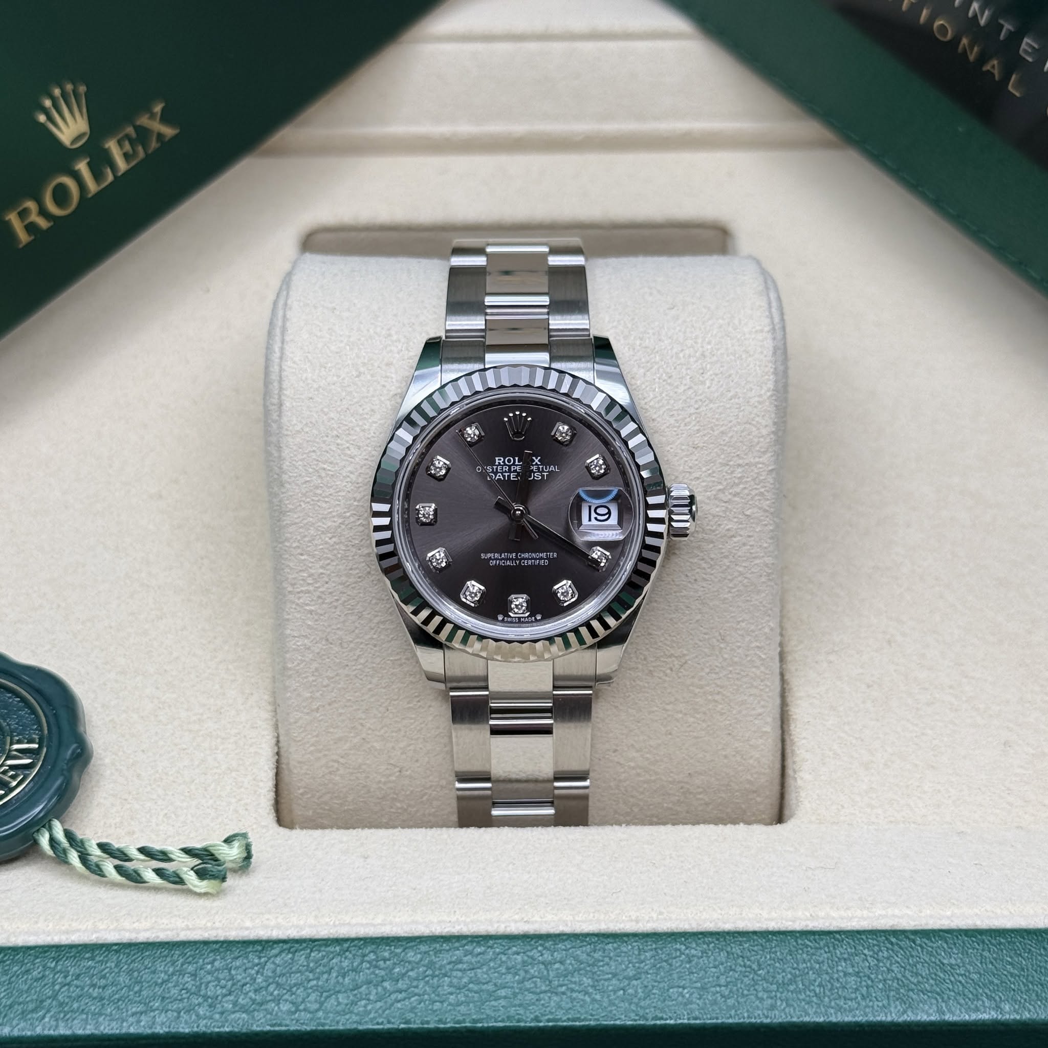 May be an image of wrist watch and text