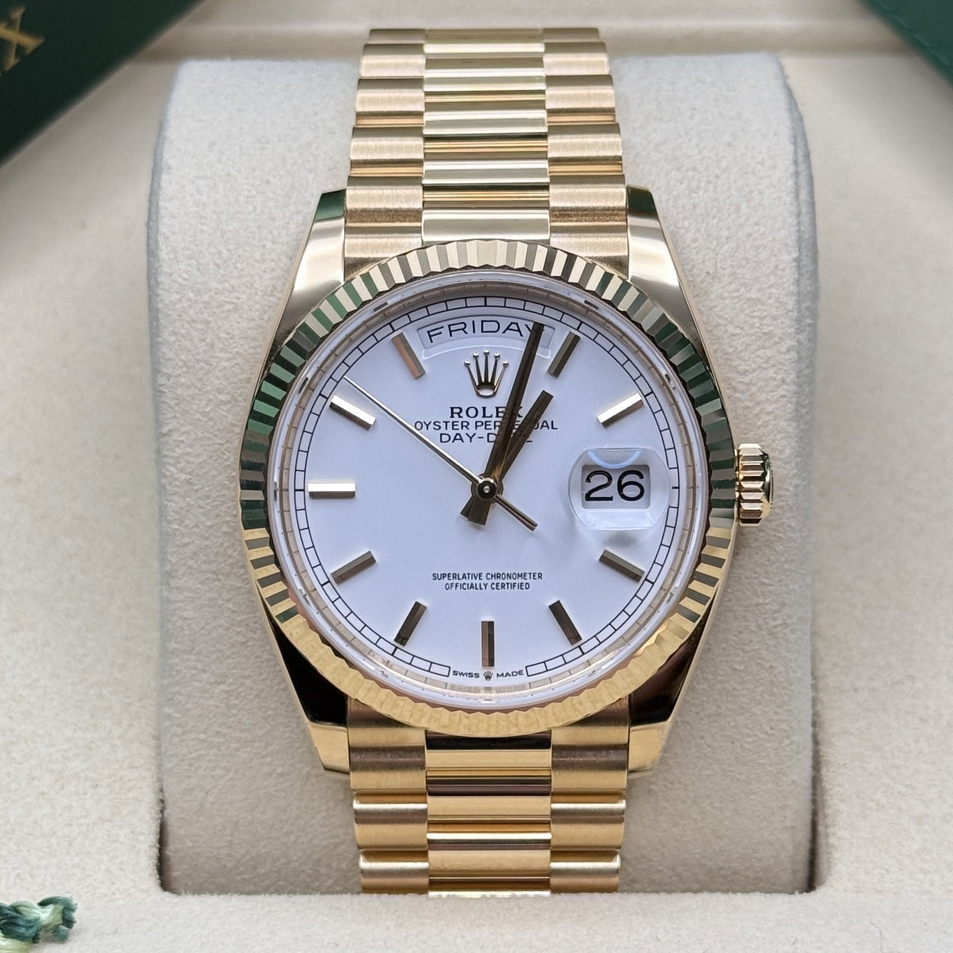 May be an image of wrist watch and text