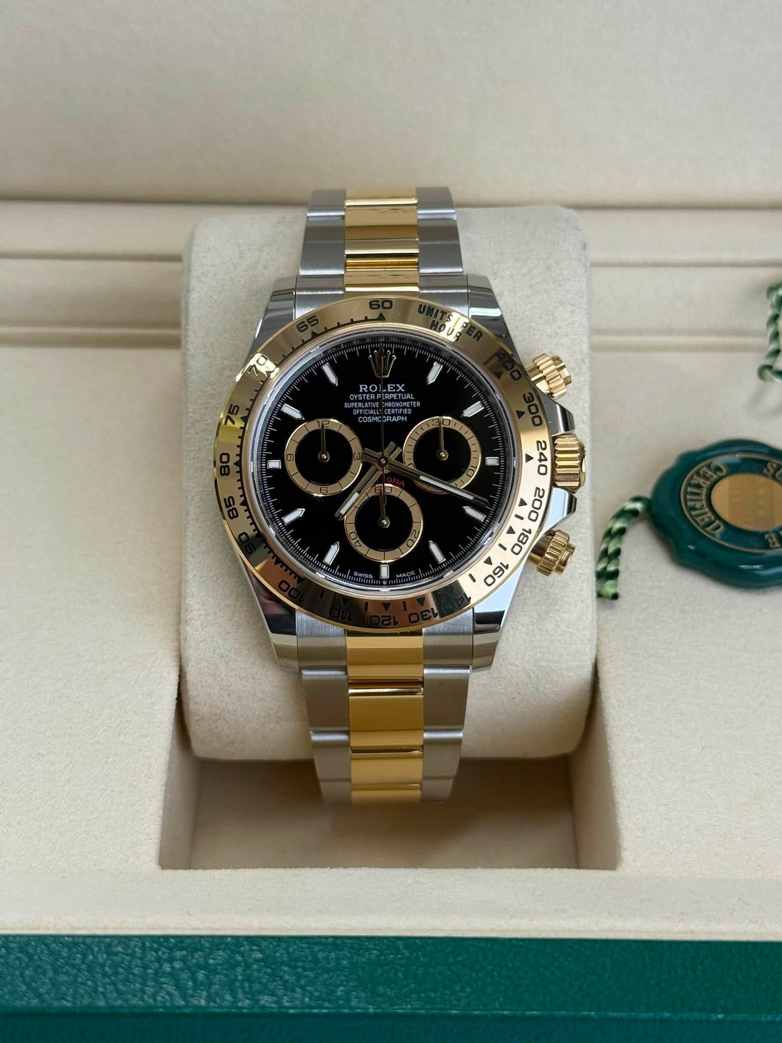 May be an image of wrist watch and text