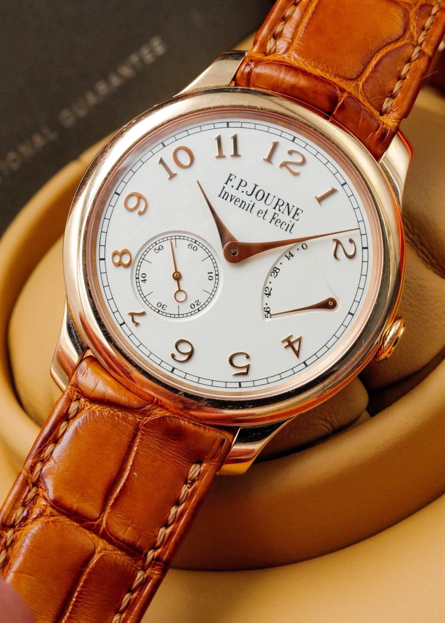 May be an image of wrist watch and text that says ' InvenitetFecit Invenit FPJOURNE et Fecit 立 ず 2 8e ٥ 7 O0 30 A 99 6 9'