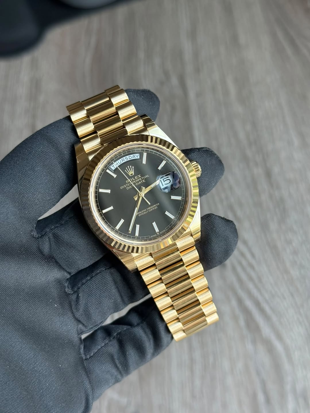 May be an image of wrist watch and text
