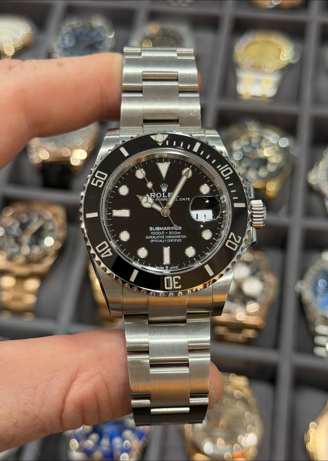 May be an image of wrist watch and text