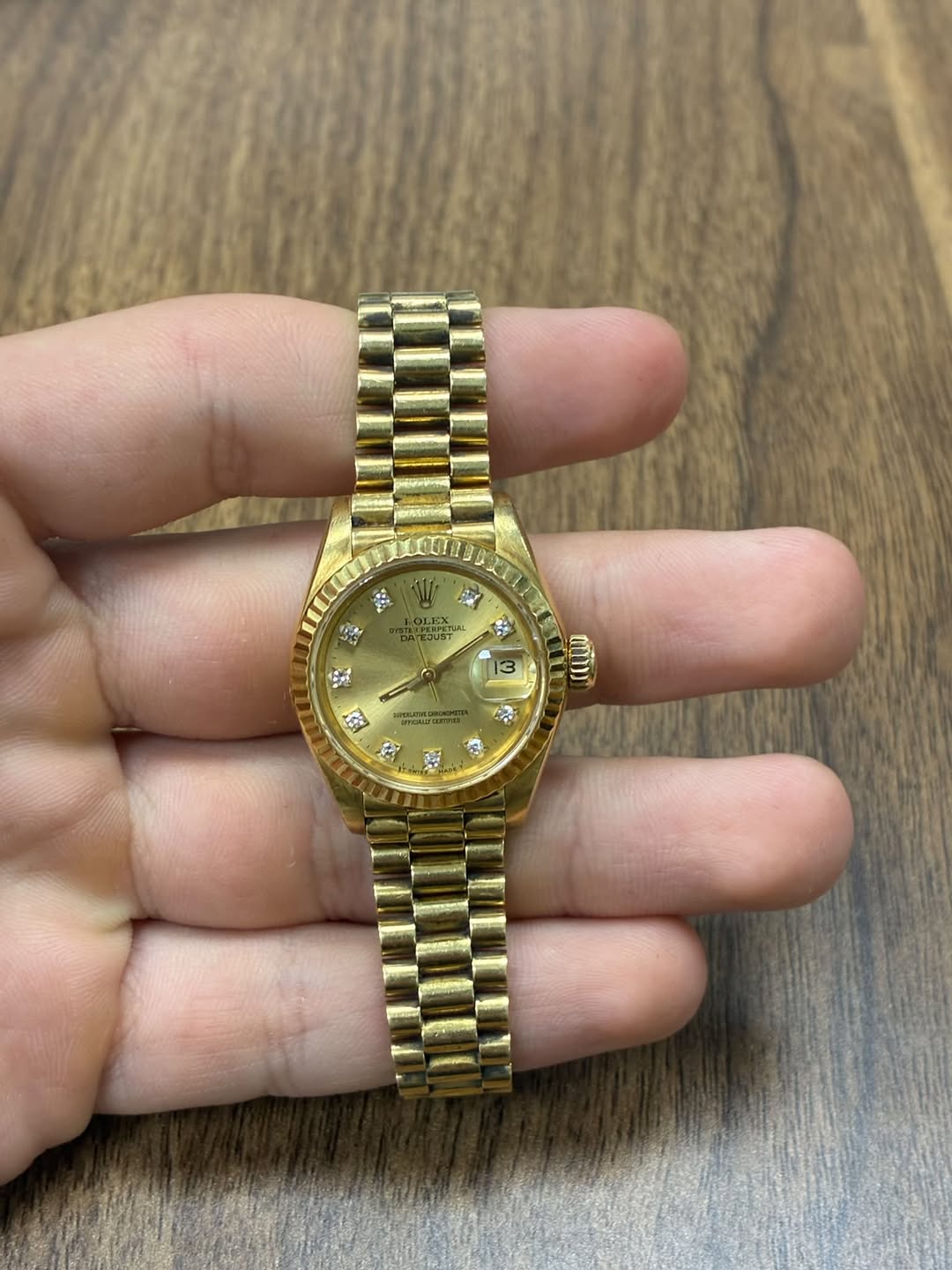 May be an image of wrist watch