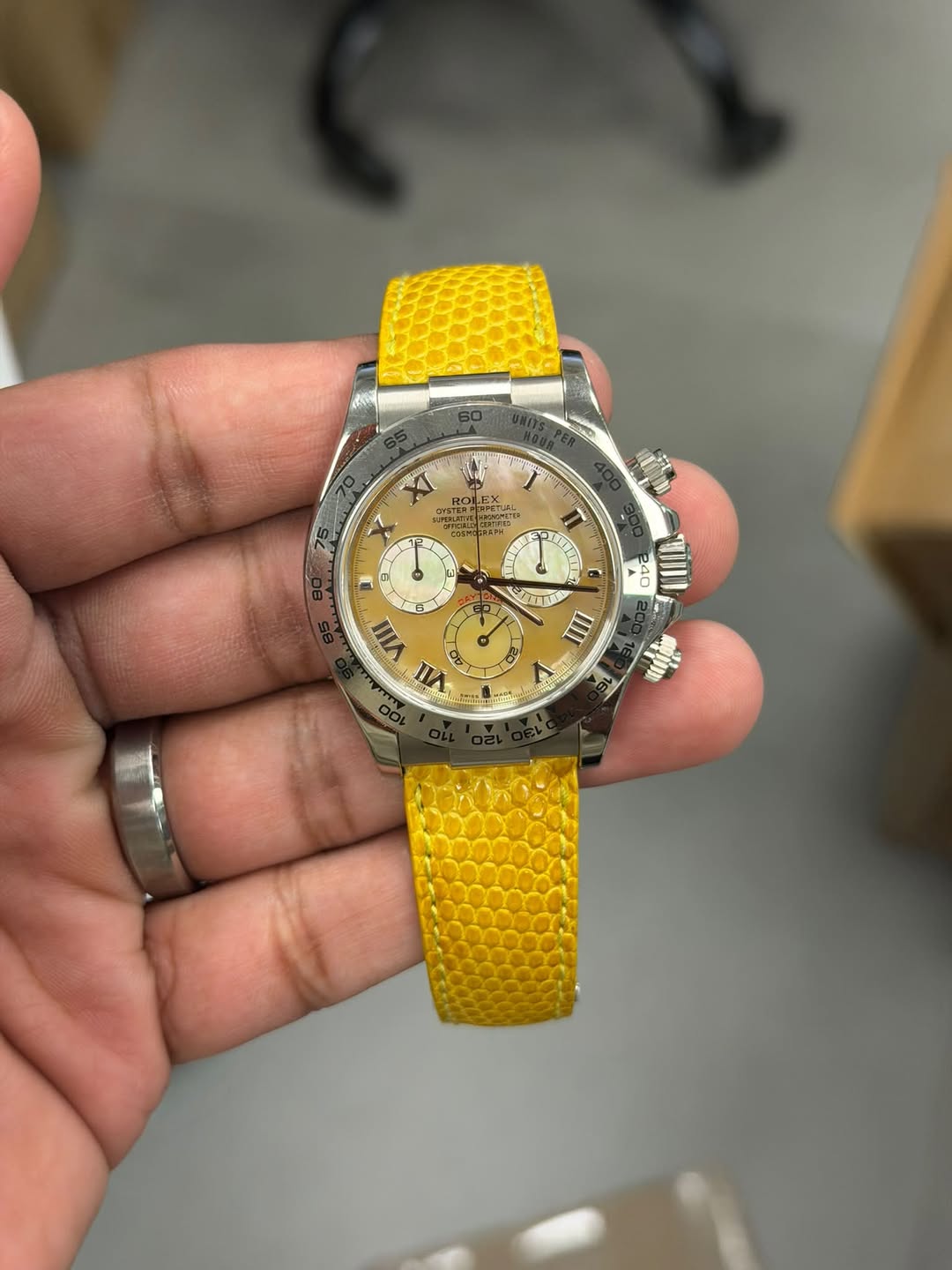 May be an image of wrist watch and text