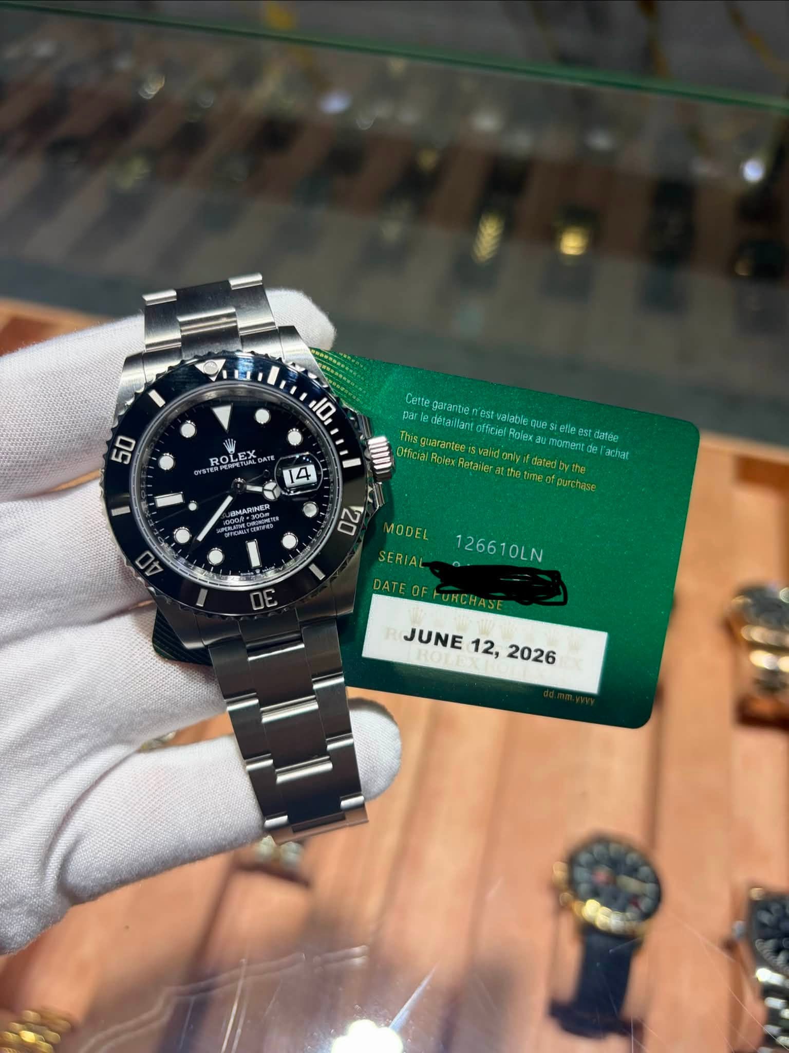 May be an image of wrist watch and text that says '50 10 ROLE 4 Cette garantie par| deranifant est valable officiel Roles Rolex u0Si elle ees t.do eSt st datóe Officia umoment…