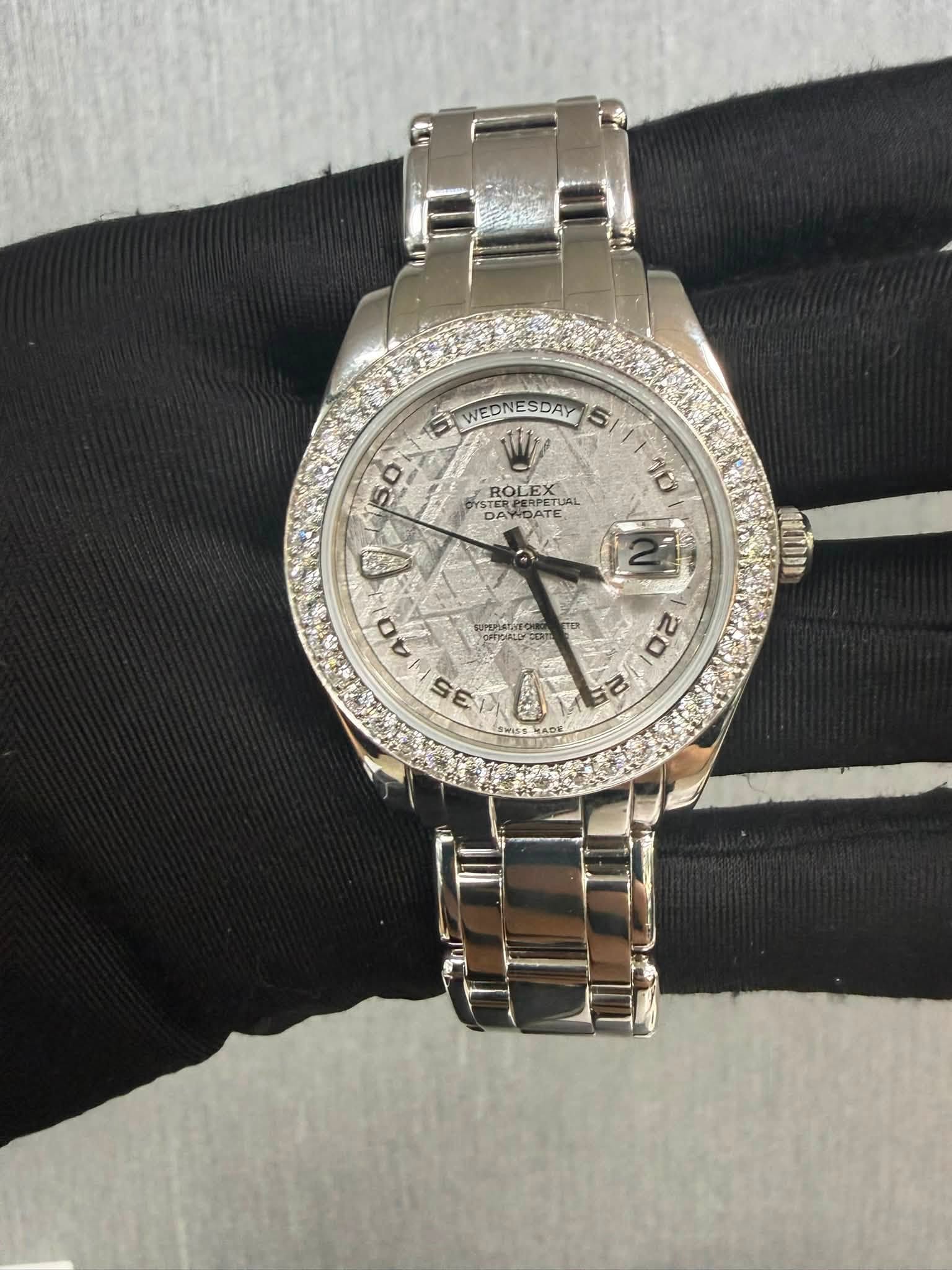 May be an image of wrist watch and text that says '타 WEDNE WEDNESDAY DAY S 50 ROLEX ERPERPETU PERUEG NDATE ROLEX DA DAWDATE ROLECAL DA 1บ U الام a uc Se'