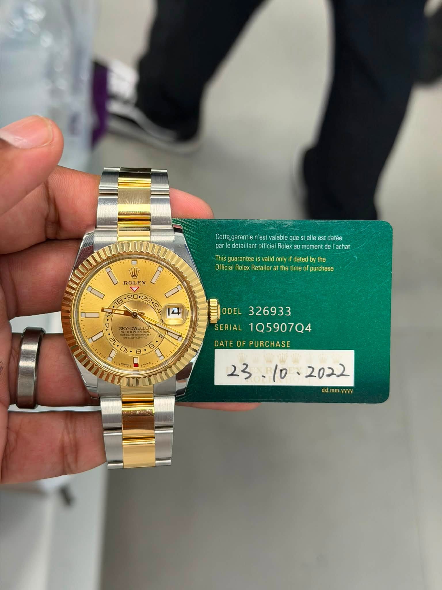 May be an image of wrist watch and text
