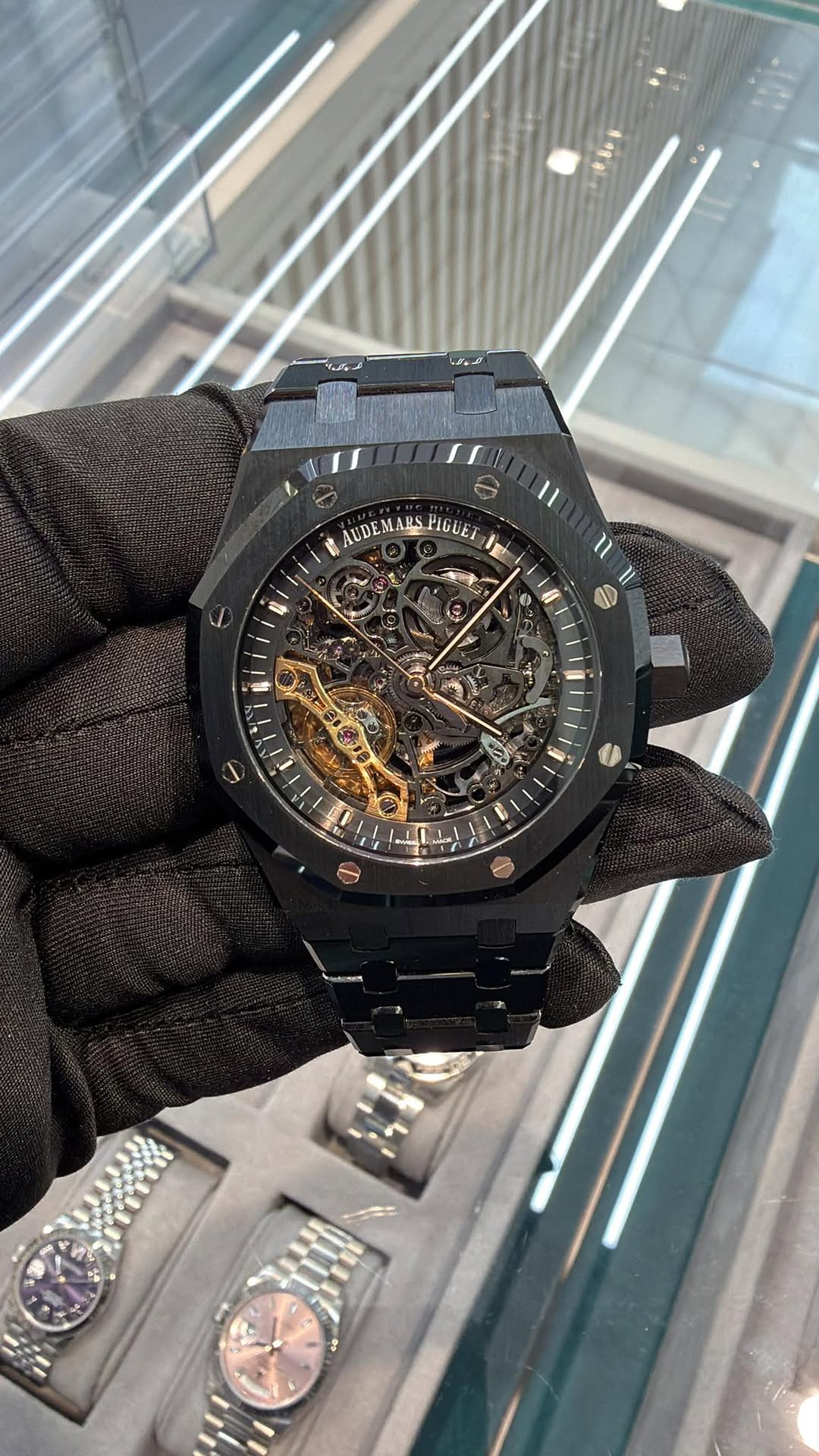 May be an image of wrist watch and text