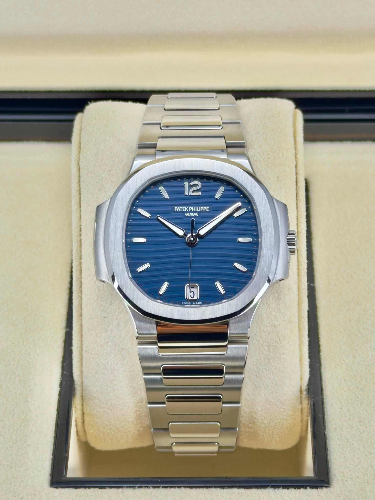 May be an image of wrist watch and text that says '12 PATEK PATEKPHILIPPE PATEKPHIUPPE HILIPPE GENEVE ป 5 ي Ssm RIRE'