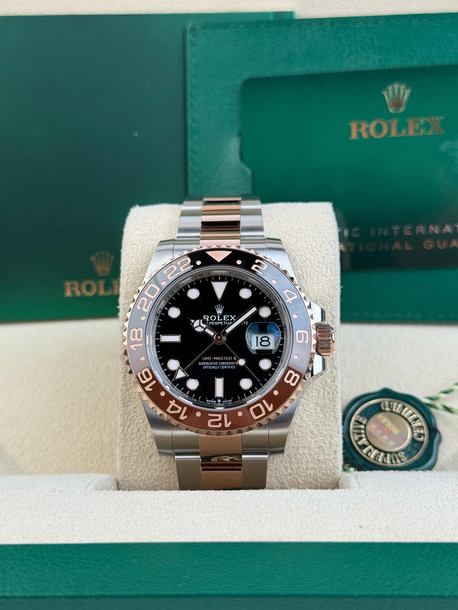 May be an image of wrist watch and text