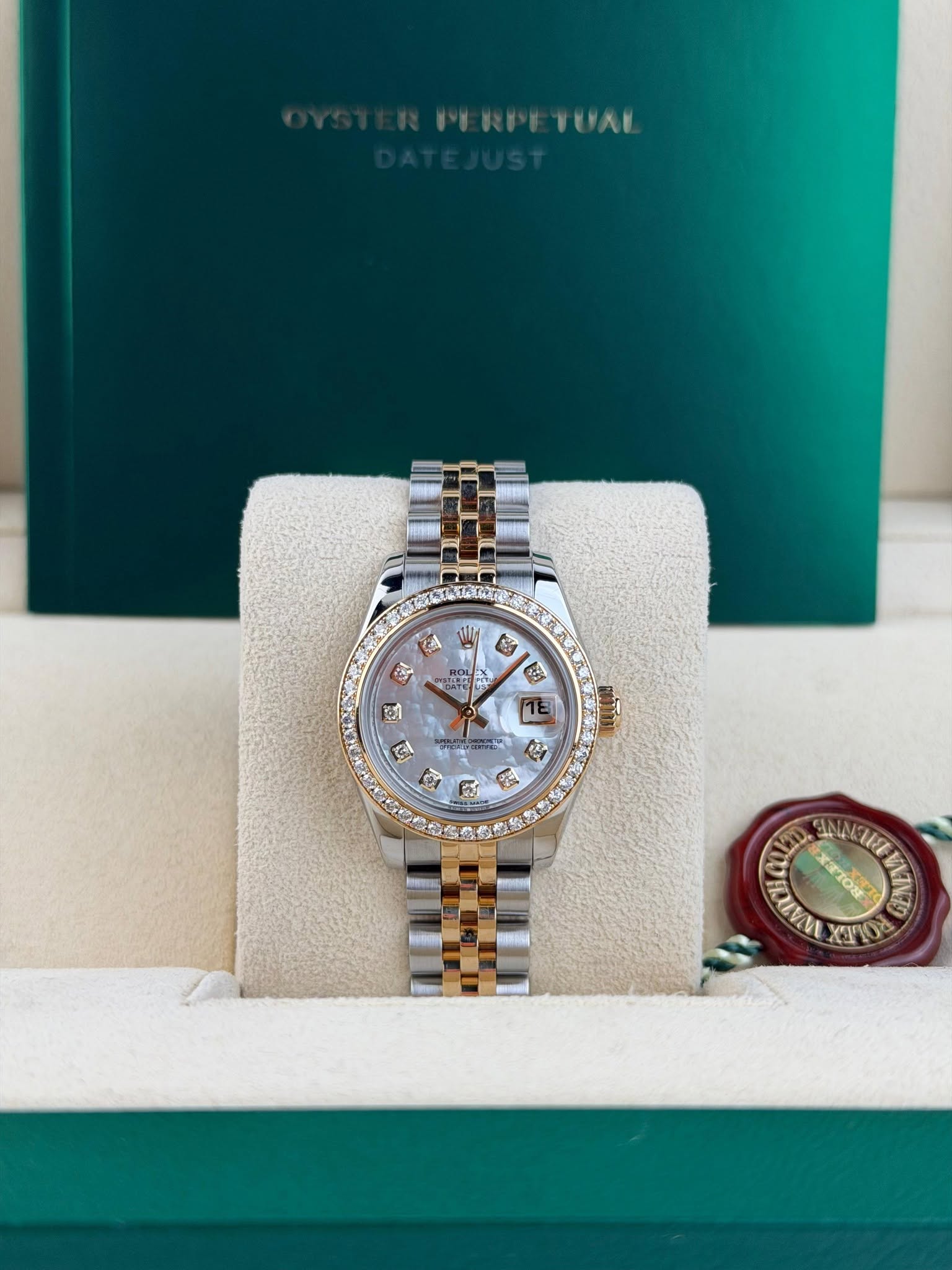 May be an image of wrist watch and text