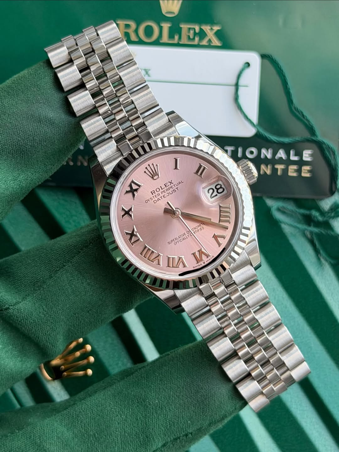May be an image of wrist watch and text