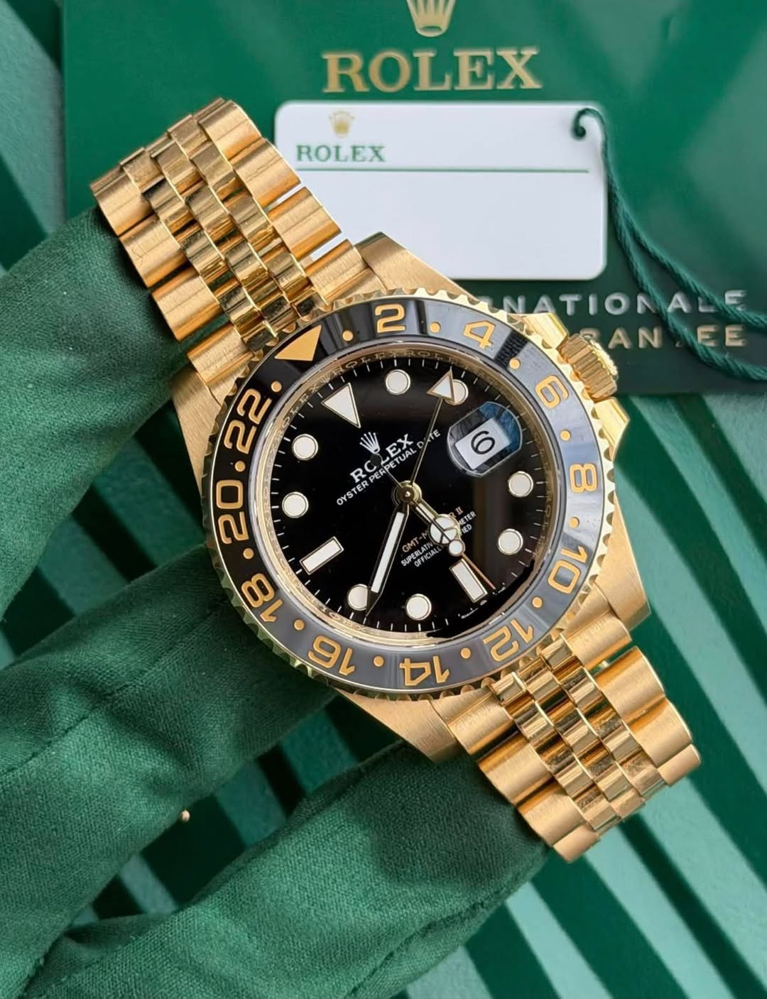 May be an image of wrist watch and text that says 'ROLEX ROLEX 2IANATIONALE NATIONALE 2 4 ANMEE AN EE 6 Εx TE RO RCLEX PEEPETUAL TUAL OYSTER (၀ 8 TER SUPERLA GM மංோ்தி CA 6 10 12…
