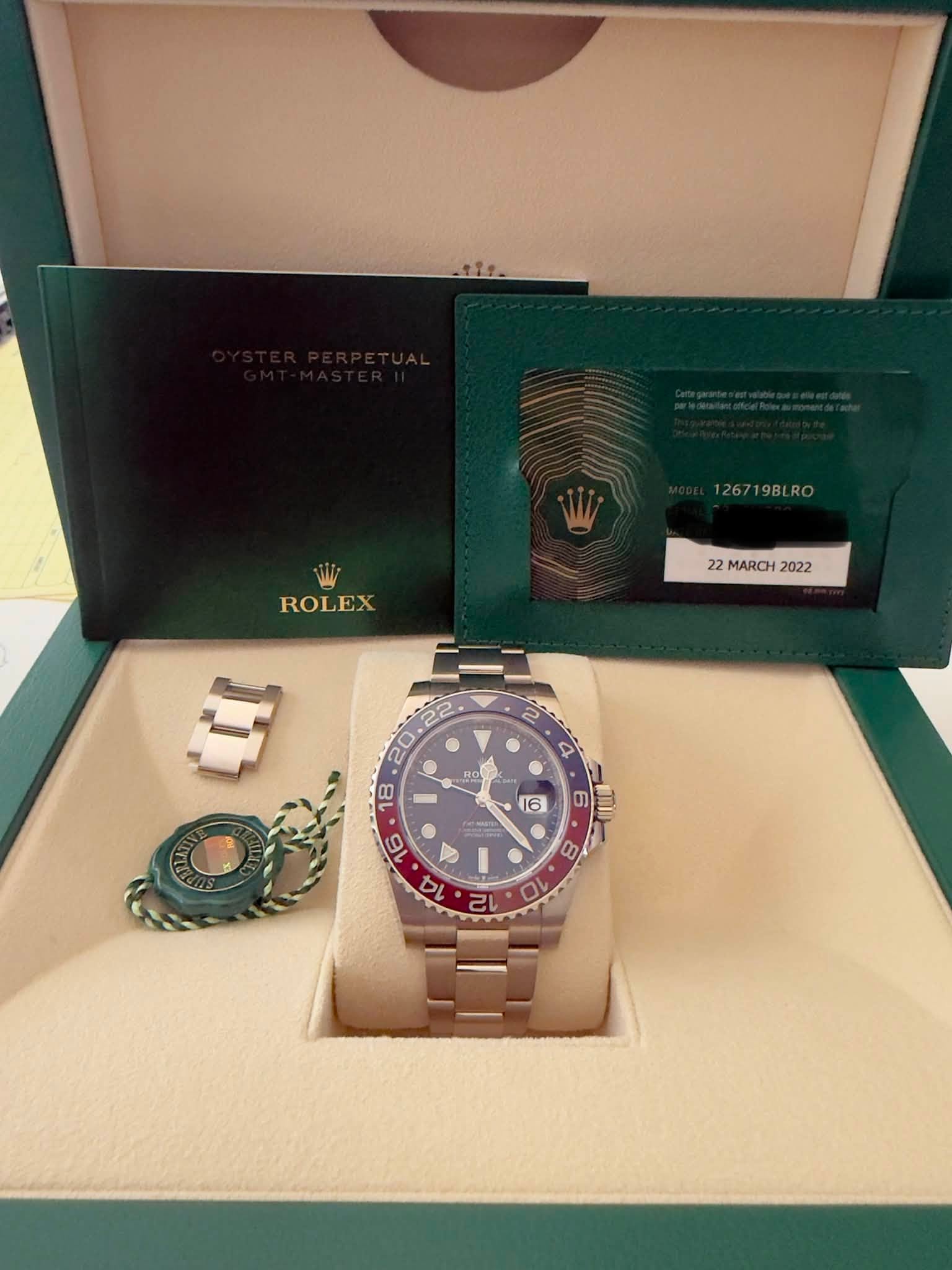 May be an image of wrist watch and text that says '126719BLR ROLEX 22MARCH2022 22 MARCH 2022 2 4 P HO X I 8 0 12'