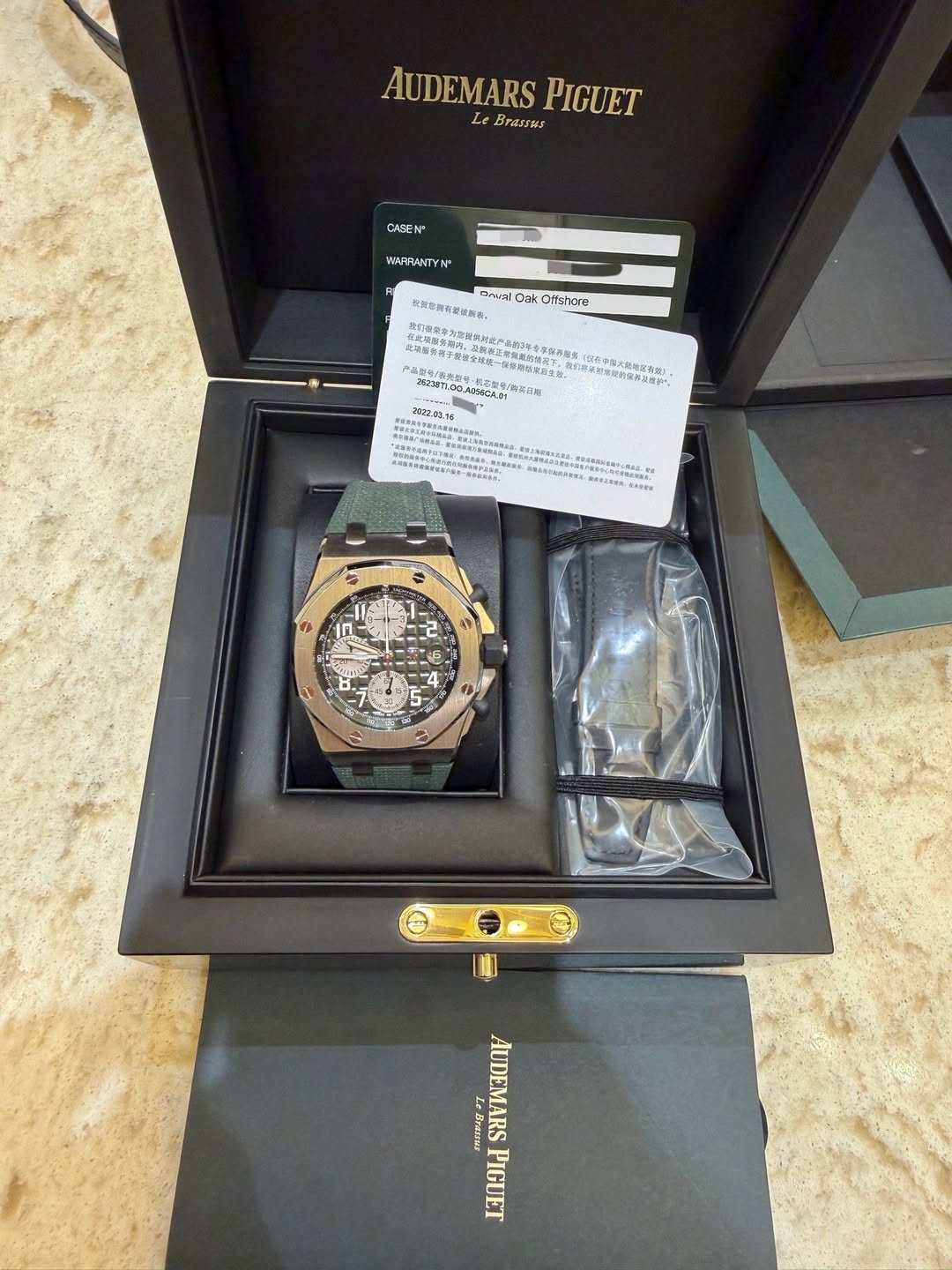 May be an image of wrist watch and text