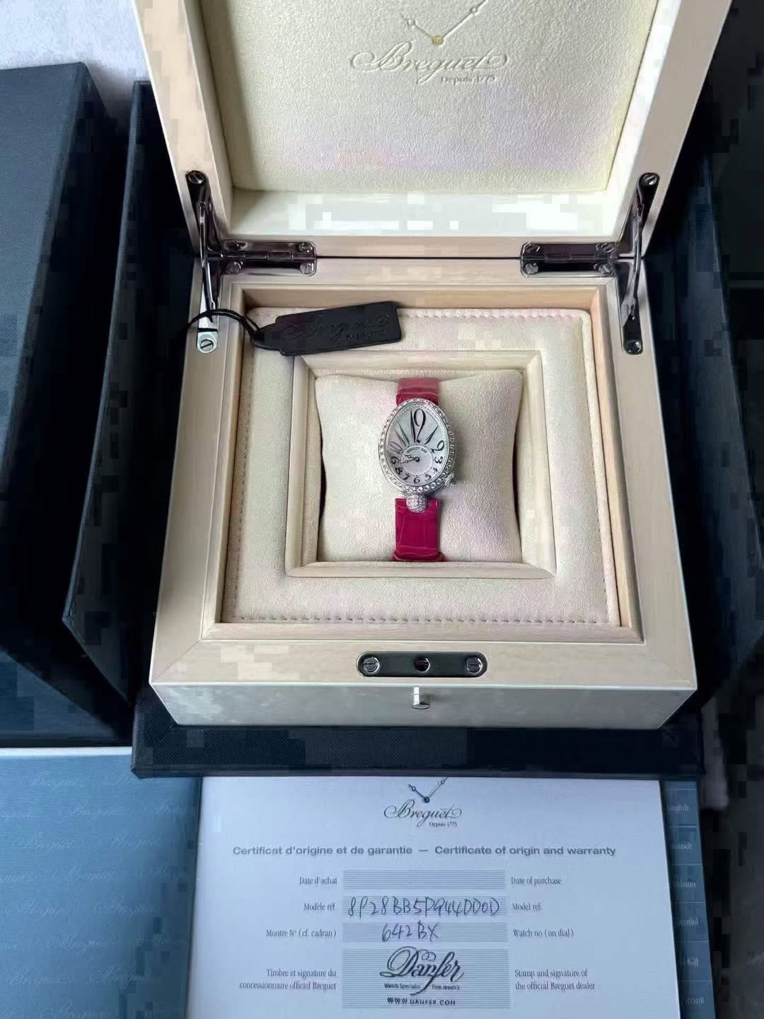 May be an image of wrist watch and text