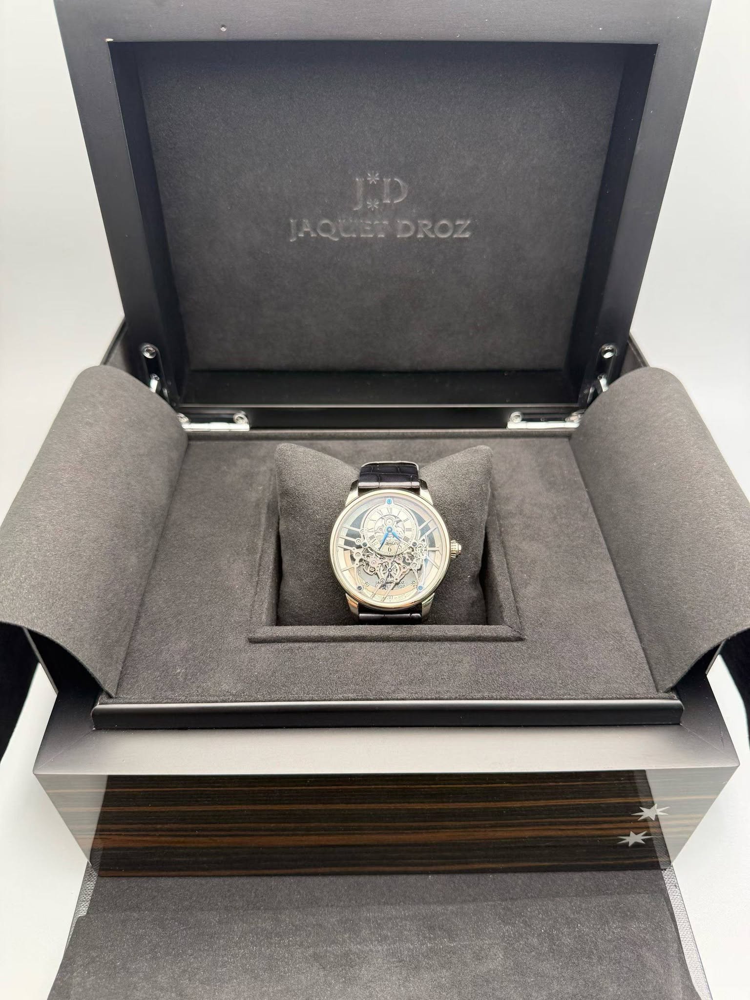 May be an image of wrist watch and text that says 'JD JAQUET QUENDROZ JAQUETDROZ DROZ'