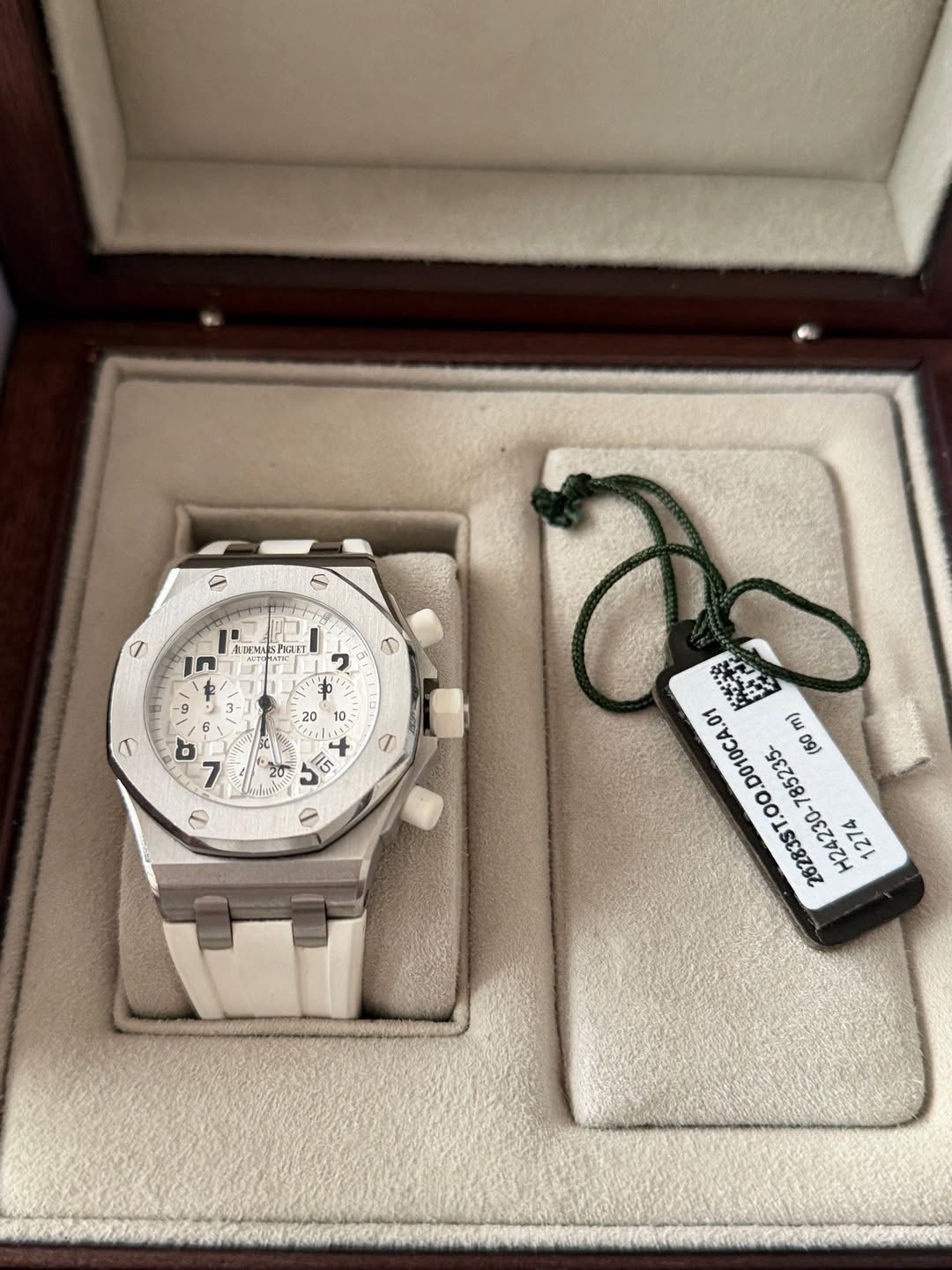 May be an image of wrist watch and text