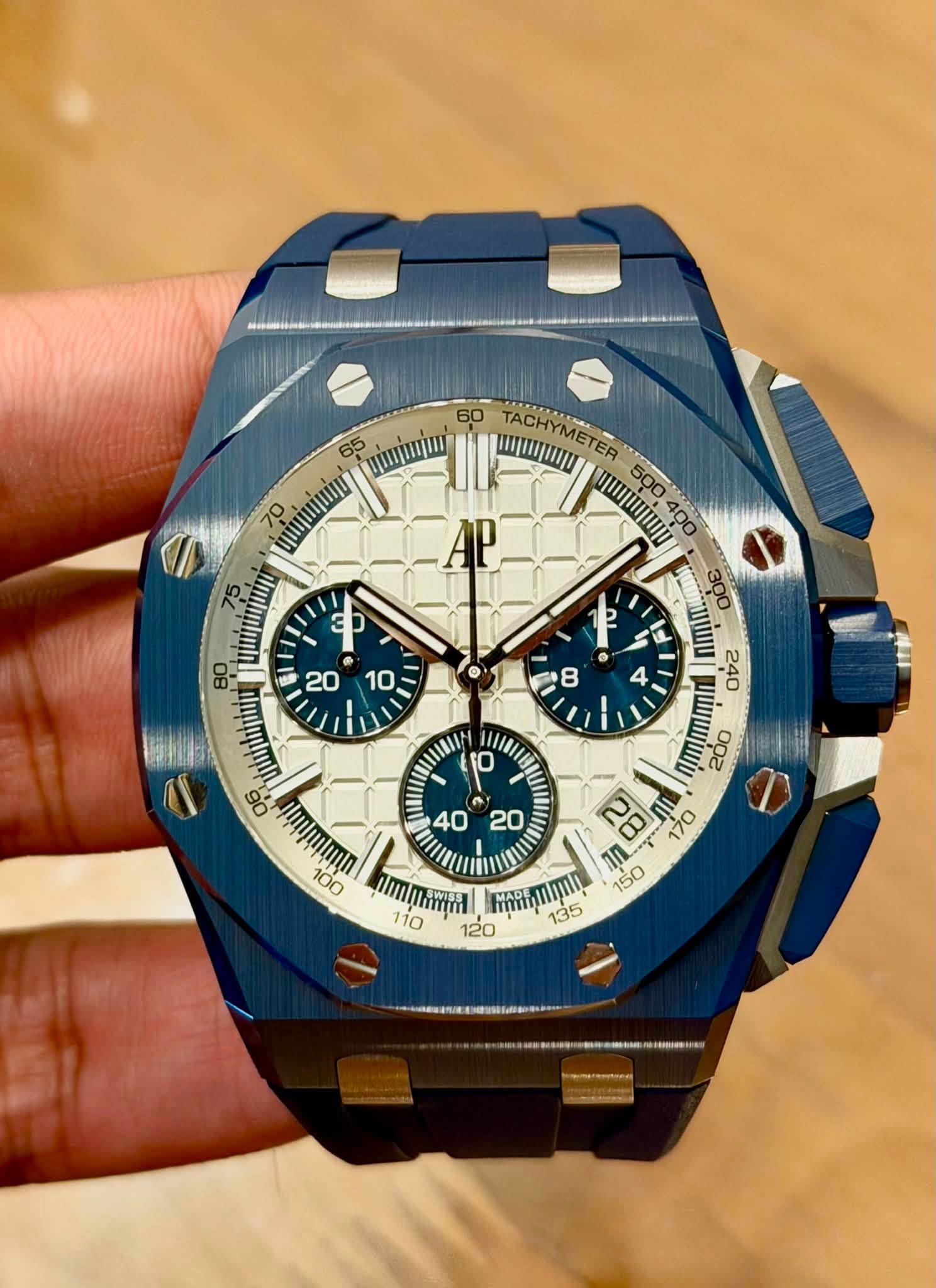 May be an image of wrist watch and text