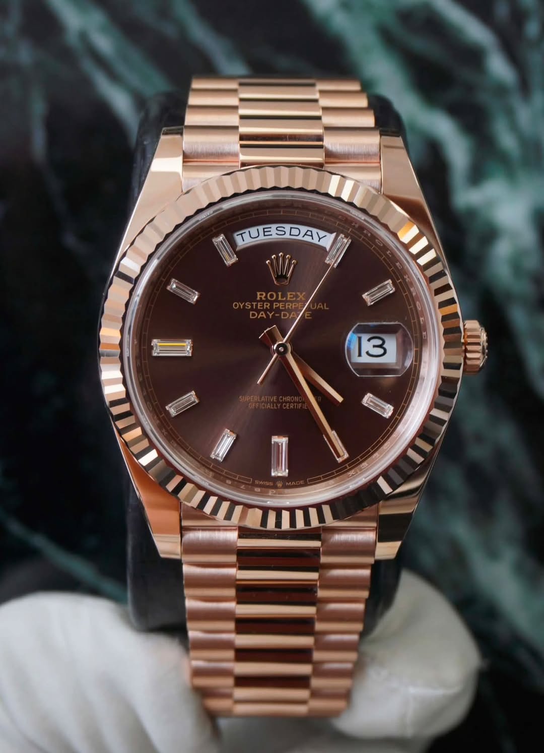May be an image of wrist watch and text