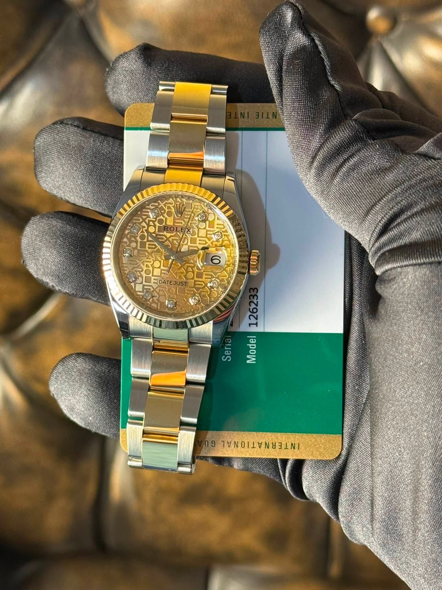 May be an image of wrist watch and text