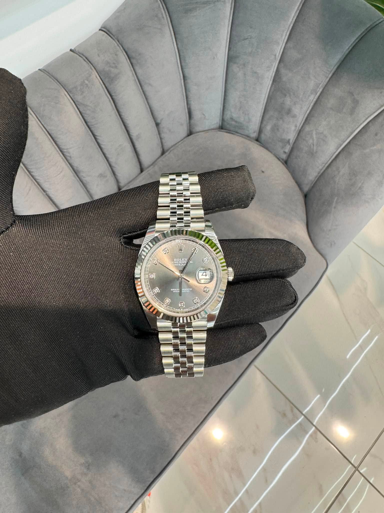 May be an image of wrist watch