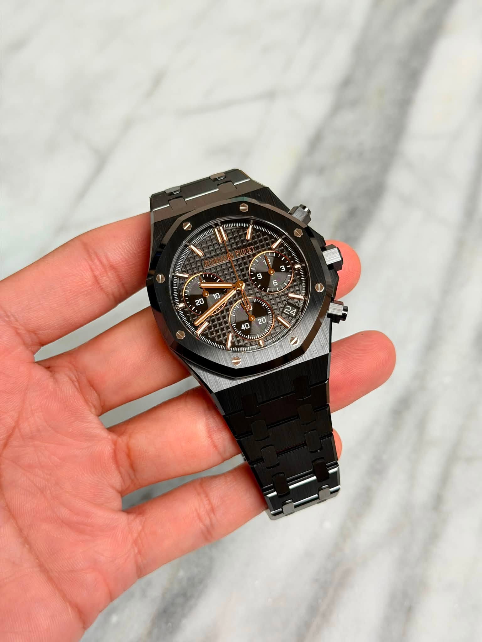 May be an image of wrist watch and text